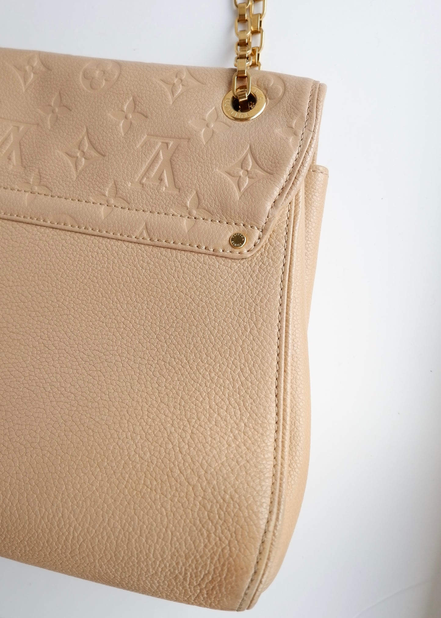 Authentic Preowned Louis Vuitton Cream Monogram Empreinte Leather St Germain MM Shoulder Bag