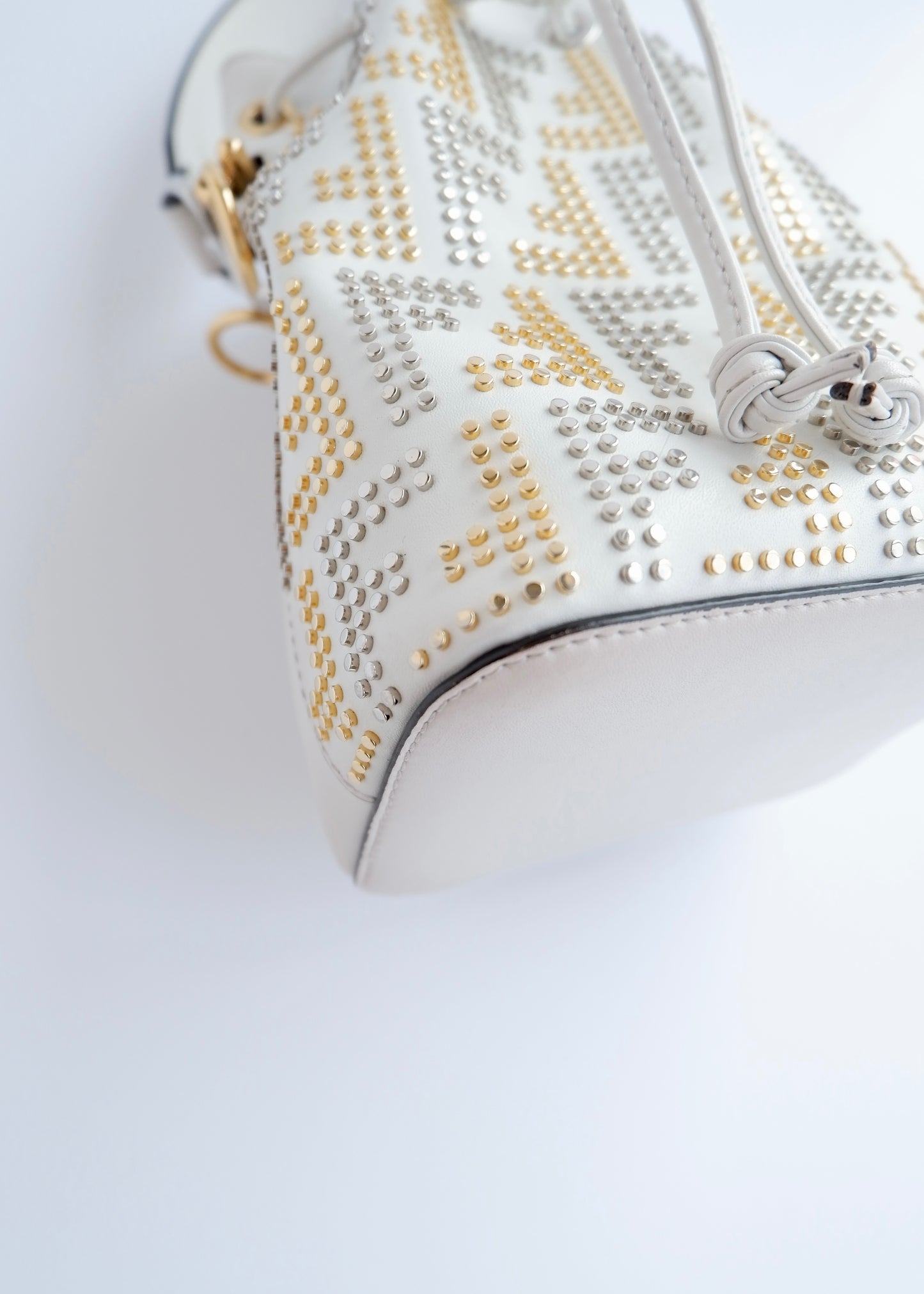 Authentic Preowned Fendi White Leather Zucca Studded Drawstring Bucket Bag