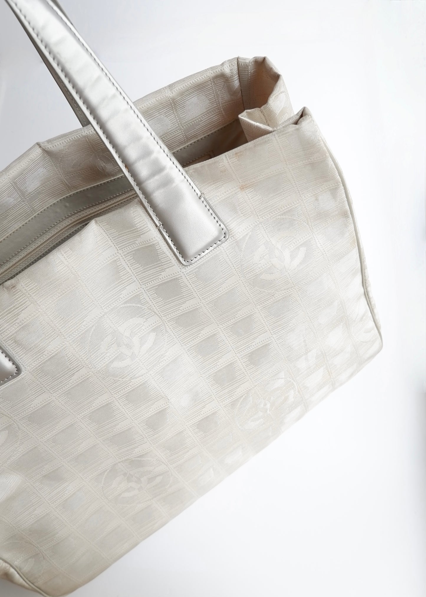 Authentic Preowned Chanel Silver Canvas New Travel Line Tote Bag