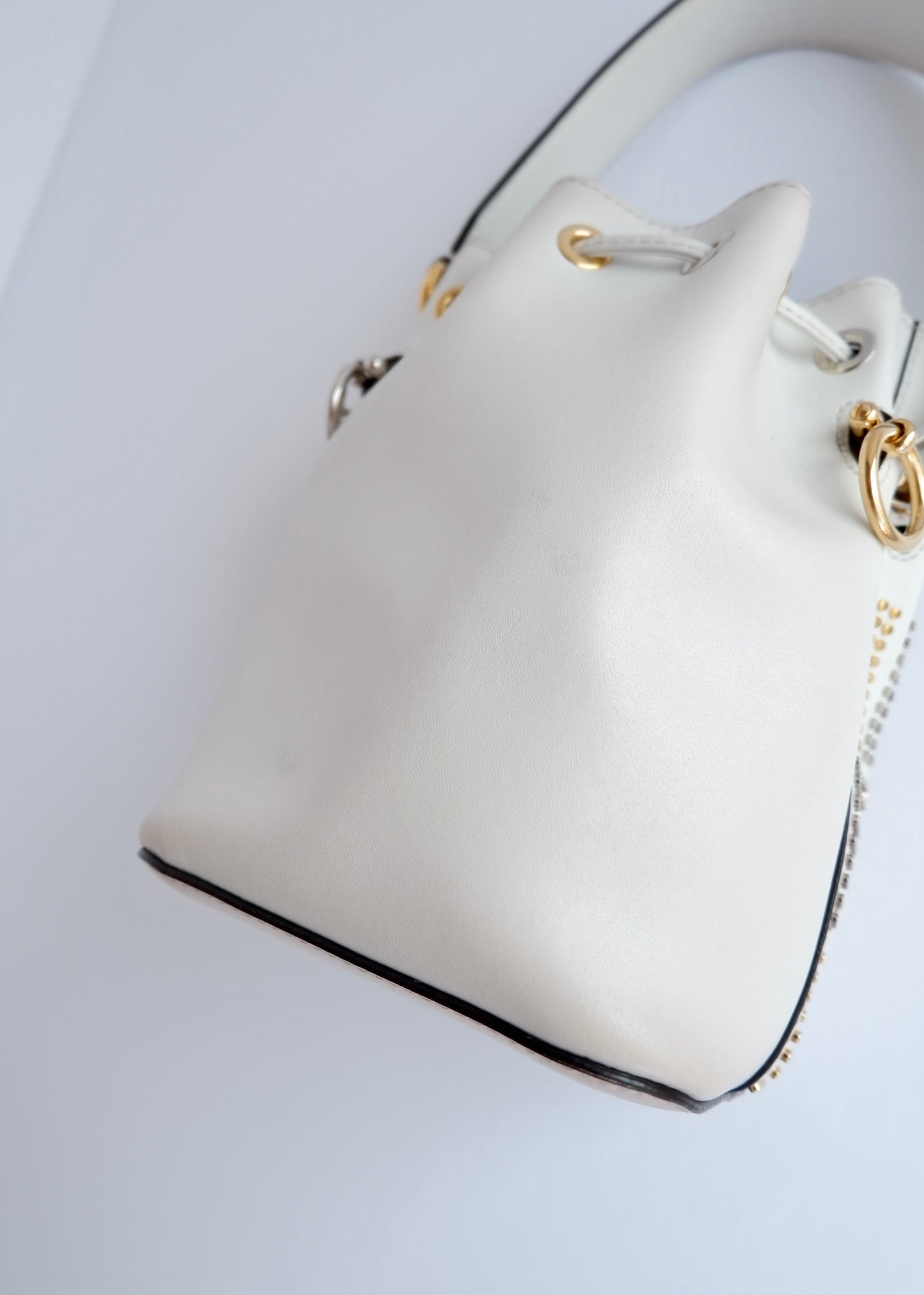 Authentic Preowned Fendi White Leather Zucca Studded Drawstring Bucket Bag