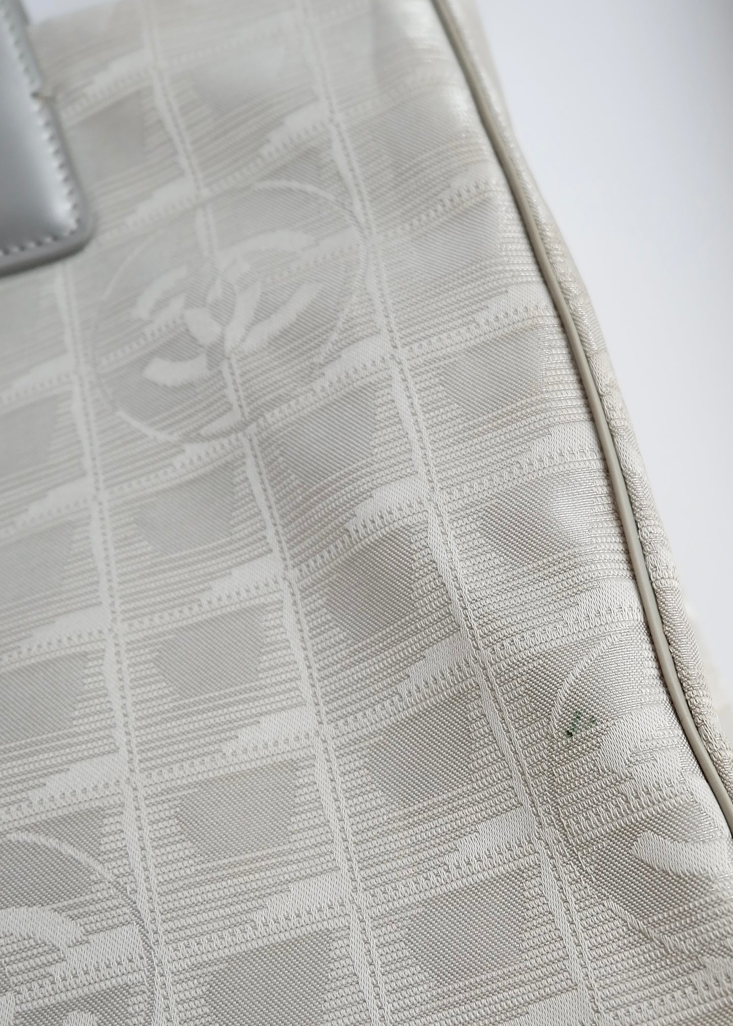 Authentic Preowned Chanel Silver Canvas New Travel Line Tote Bag