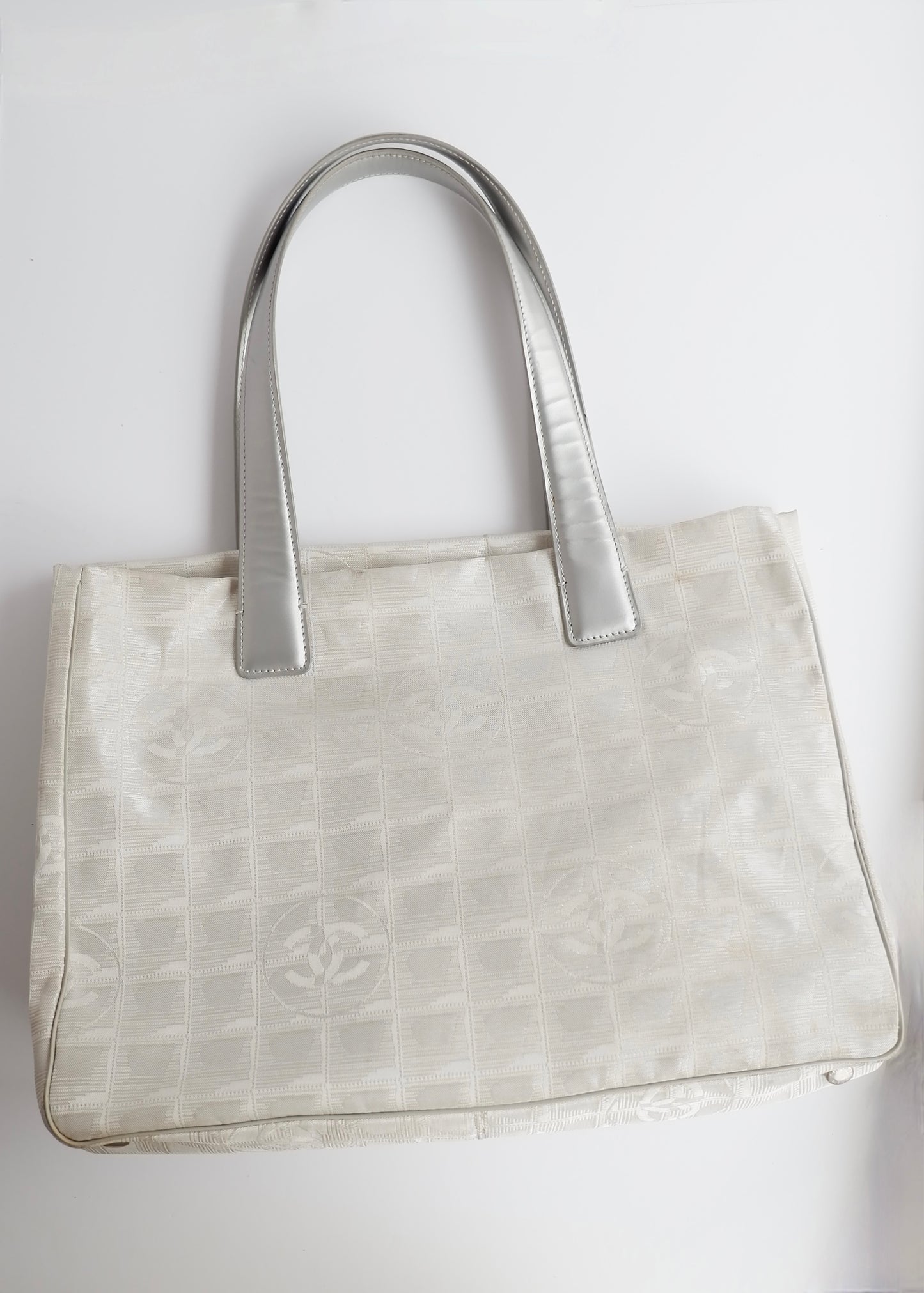 Authentic Preowned Chanel Silver Canvas New Travel Line Tote Bag