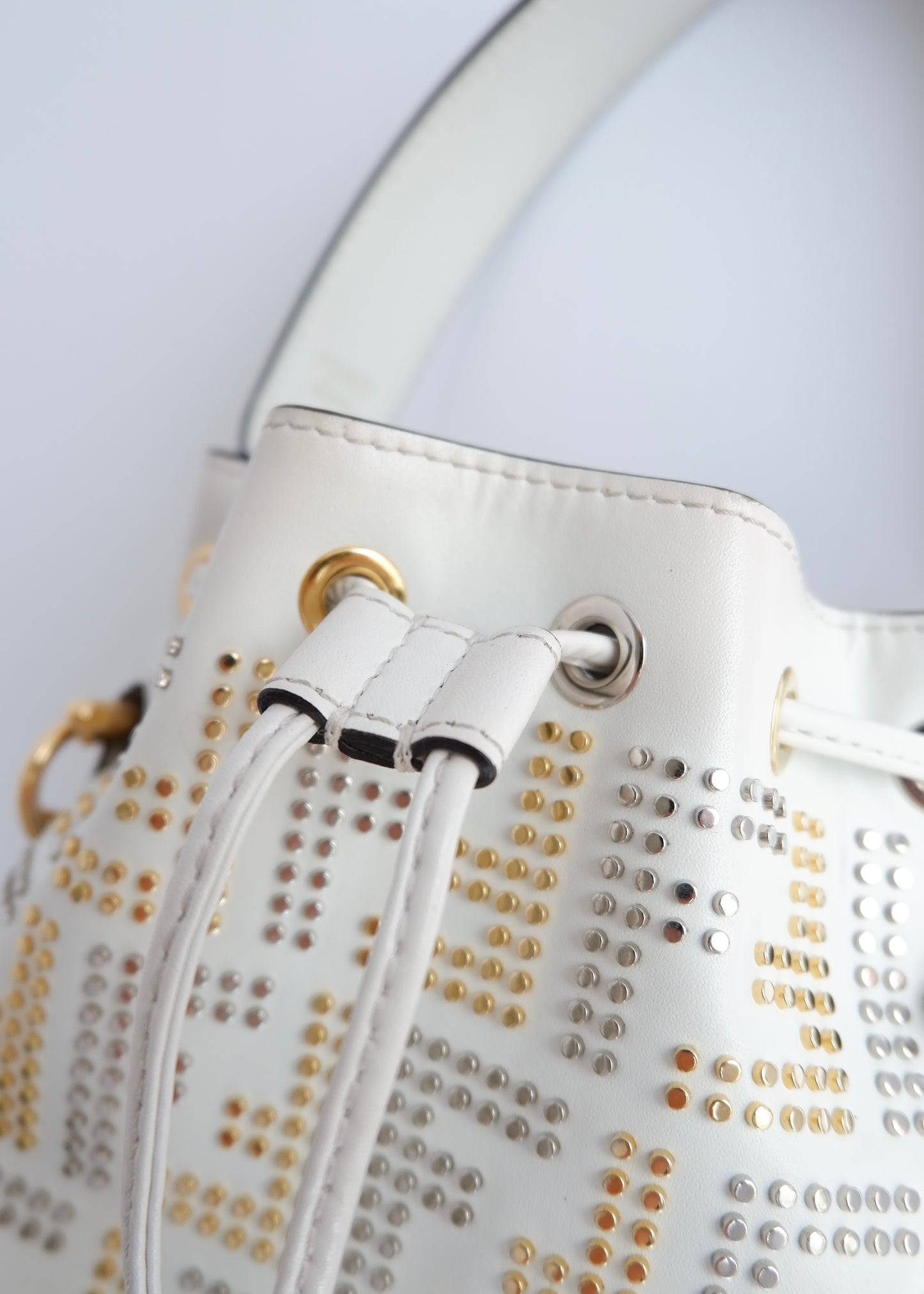 Authentic Preowned Fendi White Leather Zucca Studded Drawstring Bucket Bag