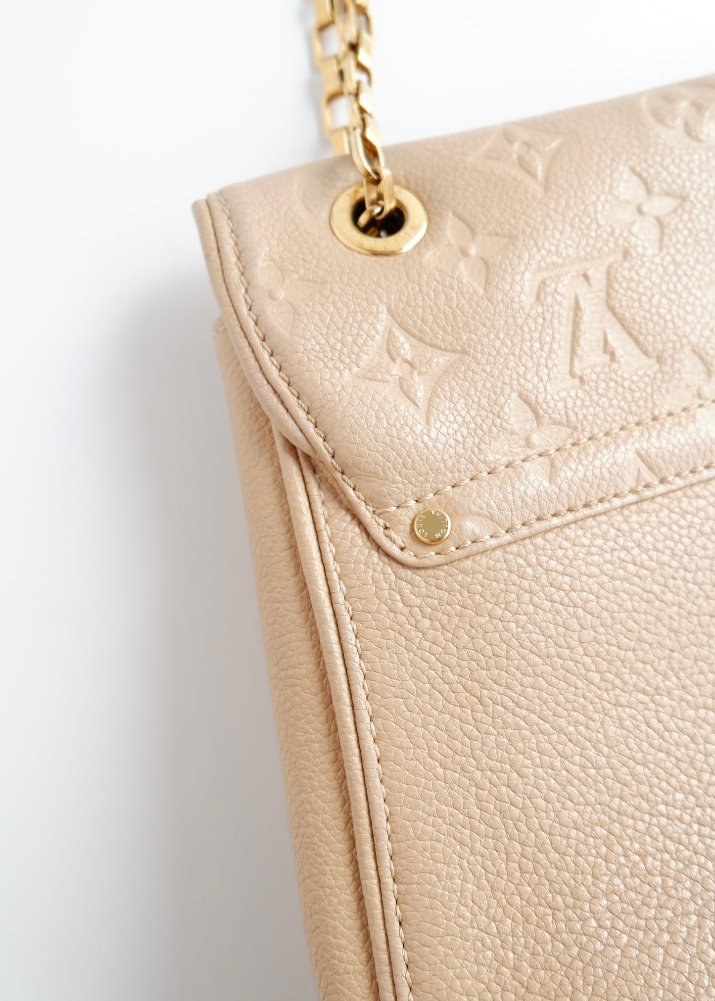 Authentic Preowned Louis Vuitton Cream Monogram Empreinte Leather St Germain MM Shoulder Bag