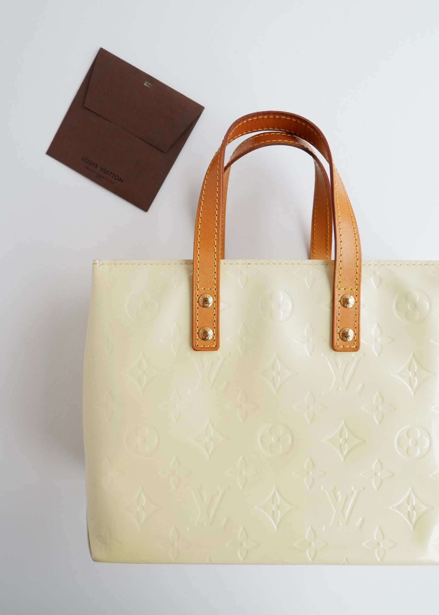 Authentic Preowned Louis Vuitton Off White Monogram Vernis Reade Handbag