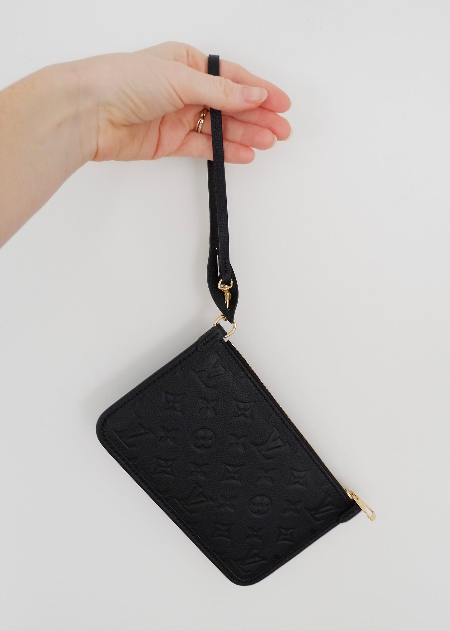 Authentic Preowned Louis Vuitton Black Empreinte Monogram Wrislet Pouch (For Neverfull)