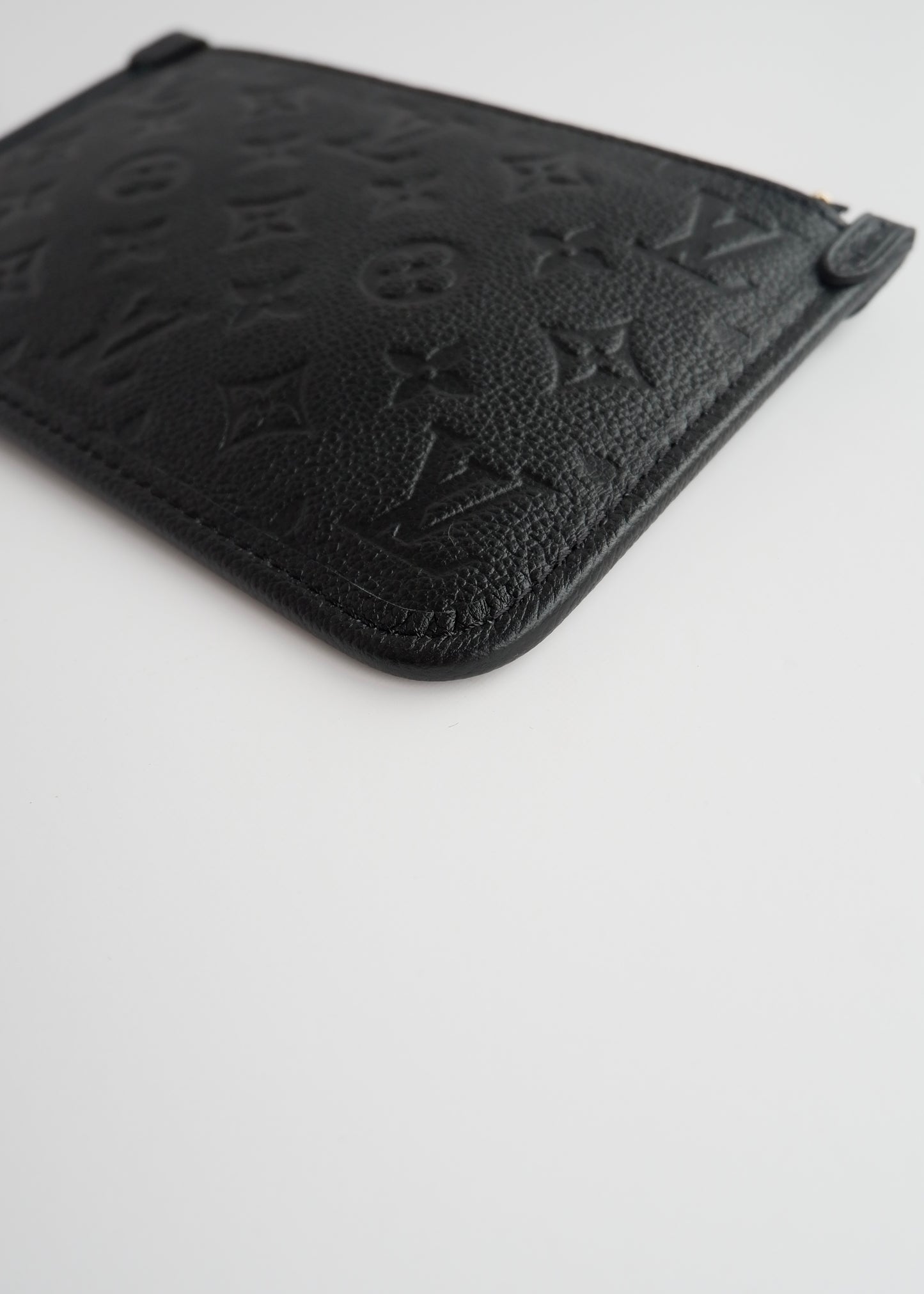 Authentic Preowned Louis Vuitton Black Empreinte Monogram Wrislet Pouch (For Neverfull)