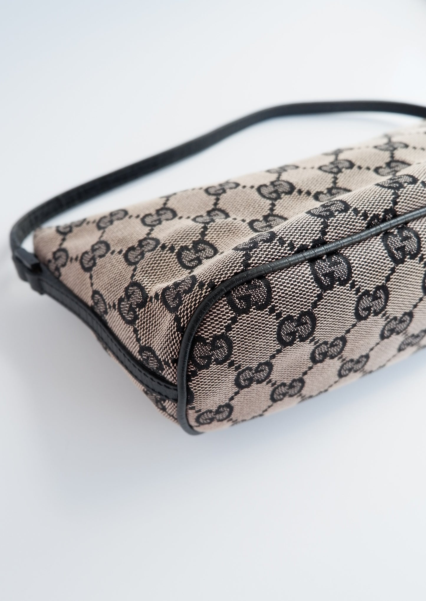 Authentic Preowned Gucci Beige/ Black Boat Pochette