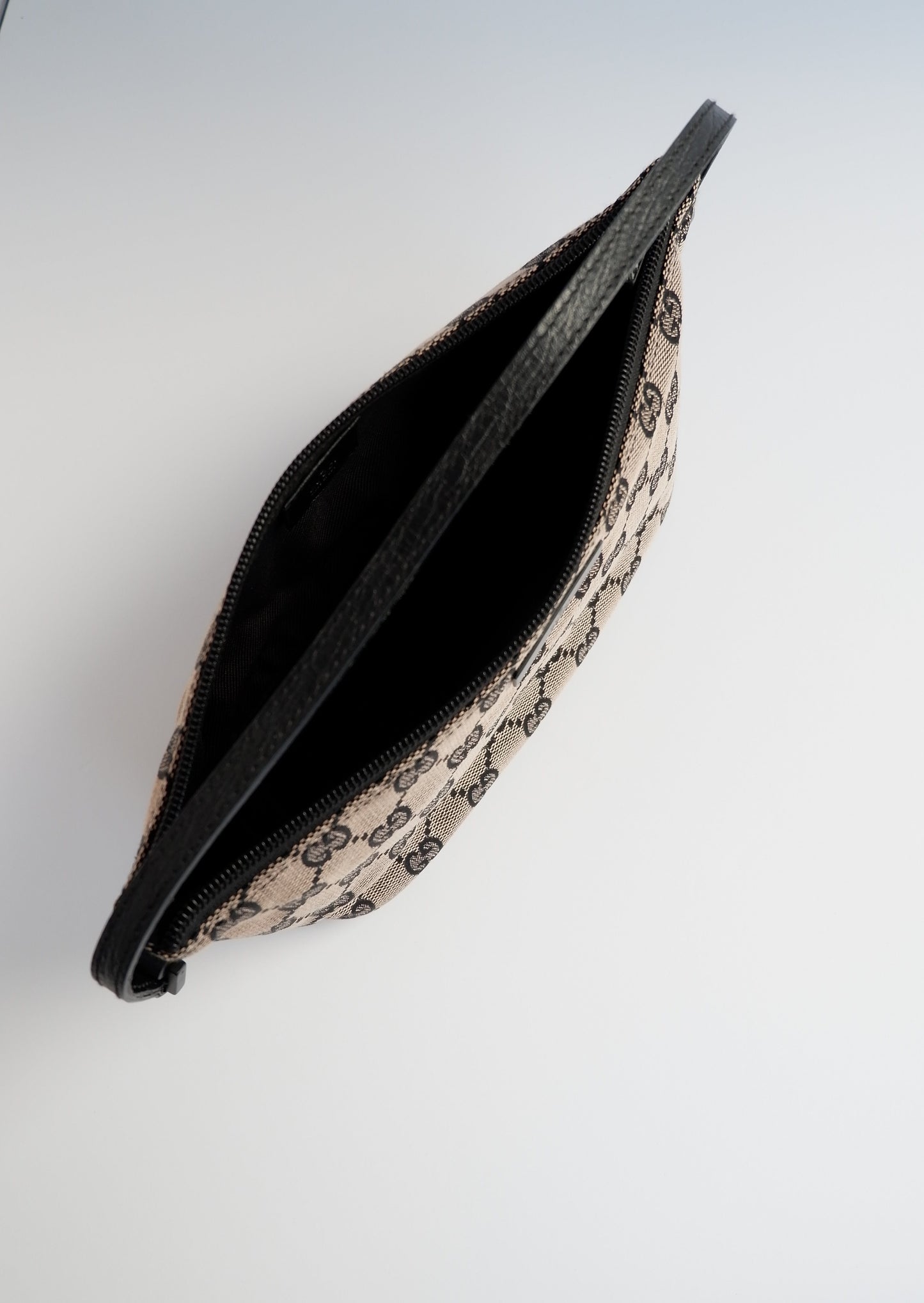 Authentic Preowned Gucci Beige/ Black Boat Pochette