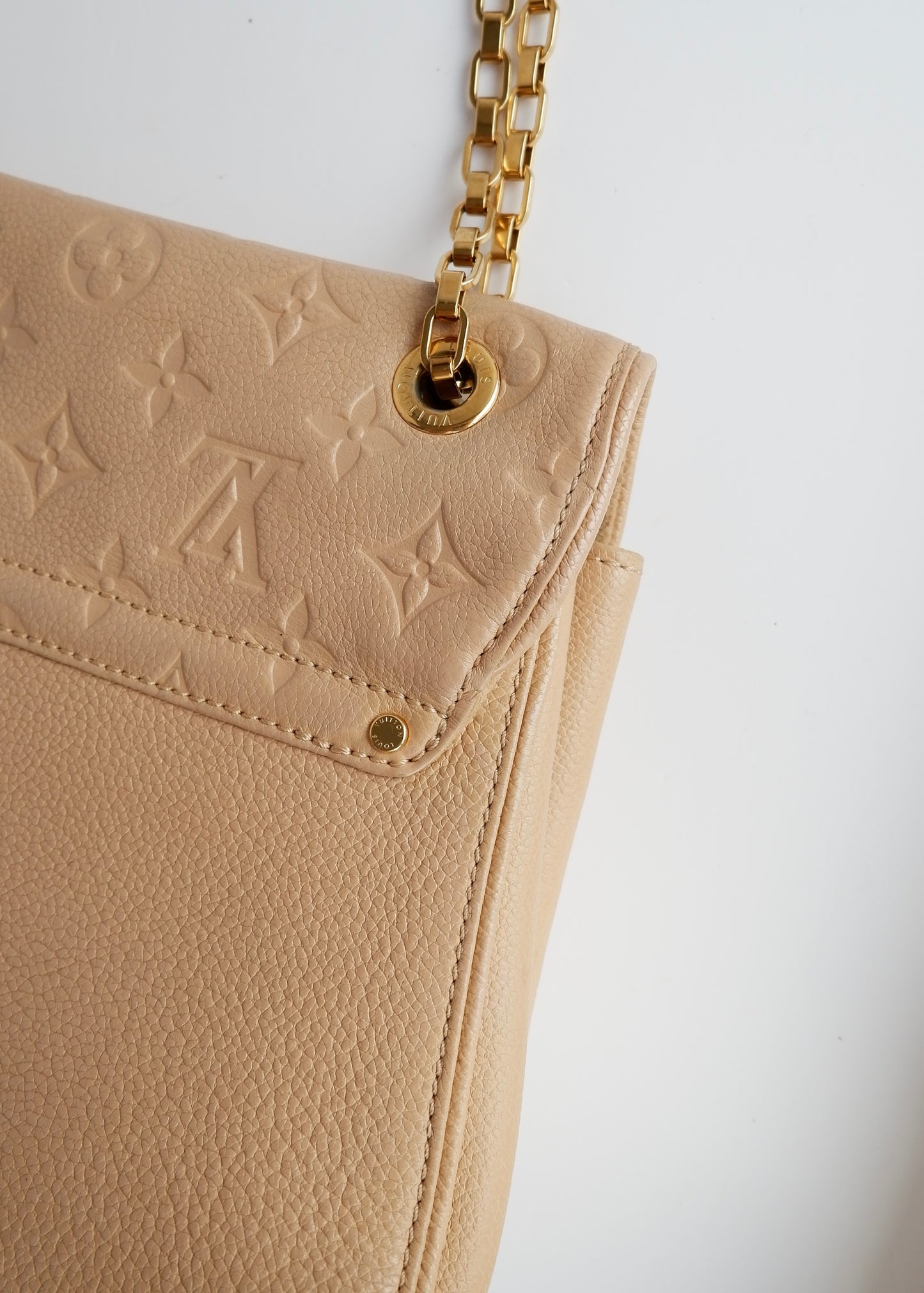 Authentic Preowned Louis Vuitton Cream Monogram Empreinte Leather St Germain MM Shoulder Bag