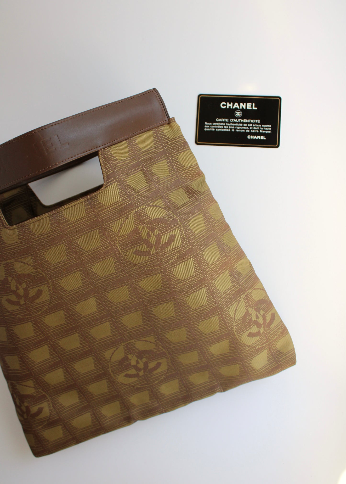 Authentic Preowned Vintage Chanel Khaki Canvas/ Leather Travel Line Clutch