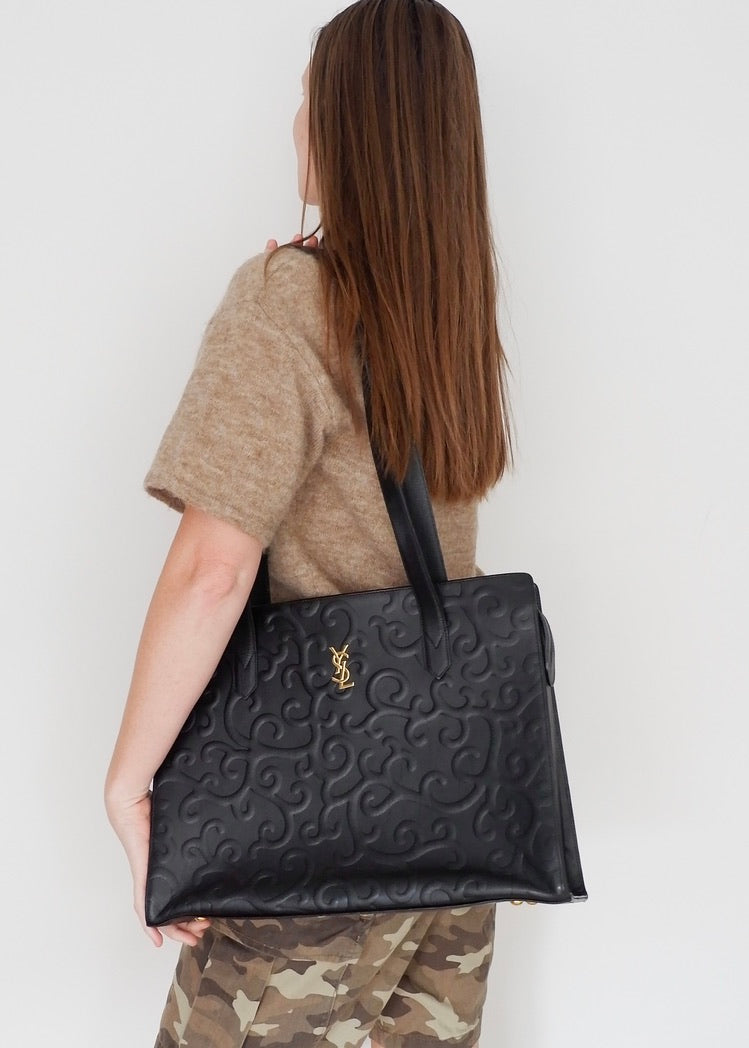 Preowned Vintage YSL Black Leather Embossed Printed Tote Bag