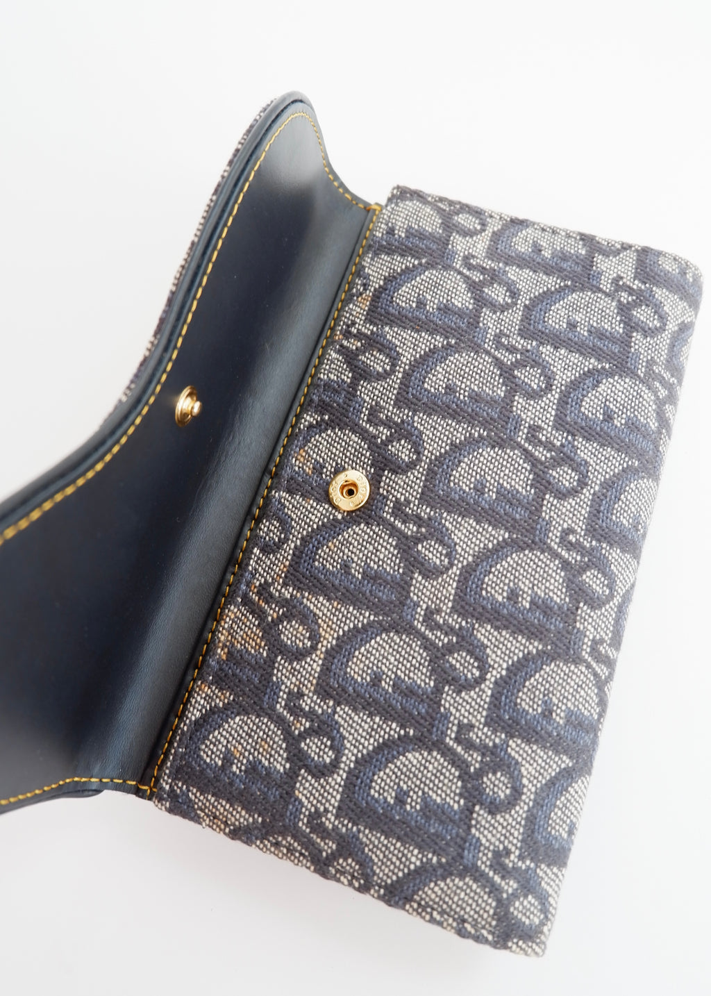 Portefeuille Dior authentique d'occasion en toile trotteur bleu marine