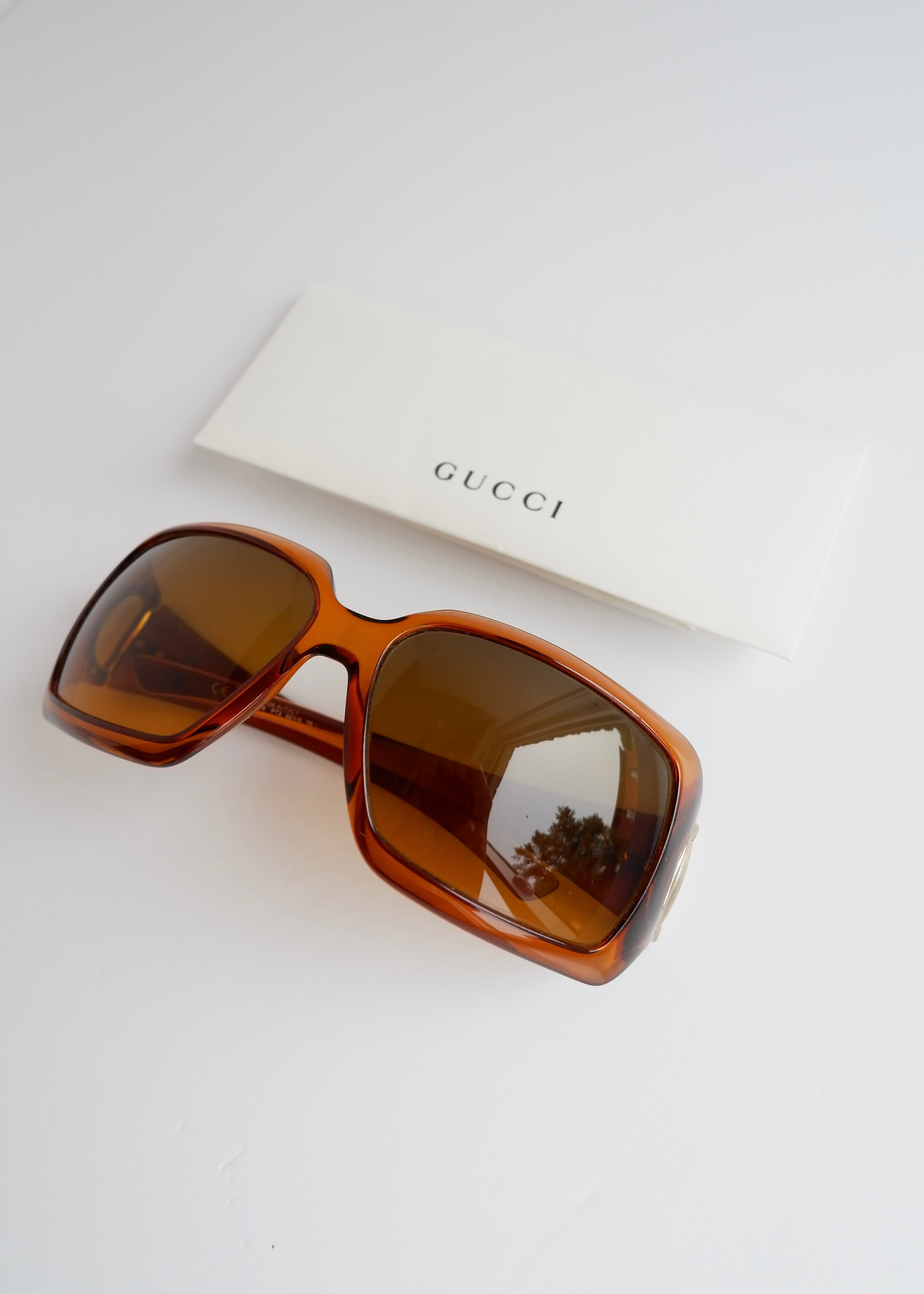 Authentiques Lunettes de Soleil Carrées Gucci Marron avec Mors de Cheval d'Occasion