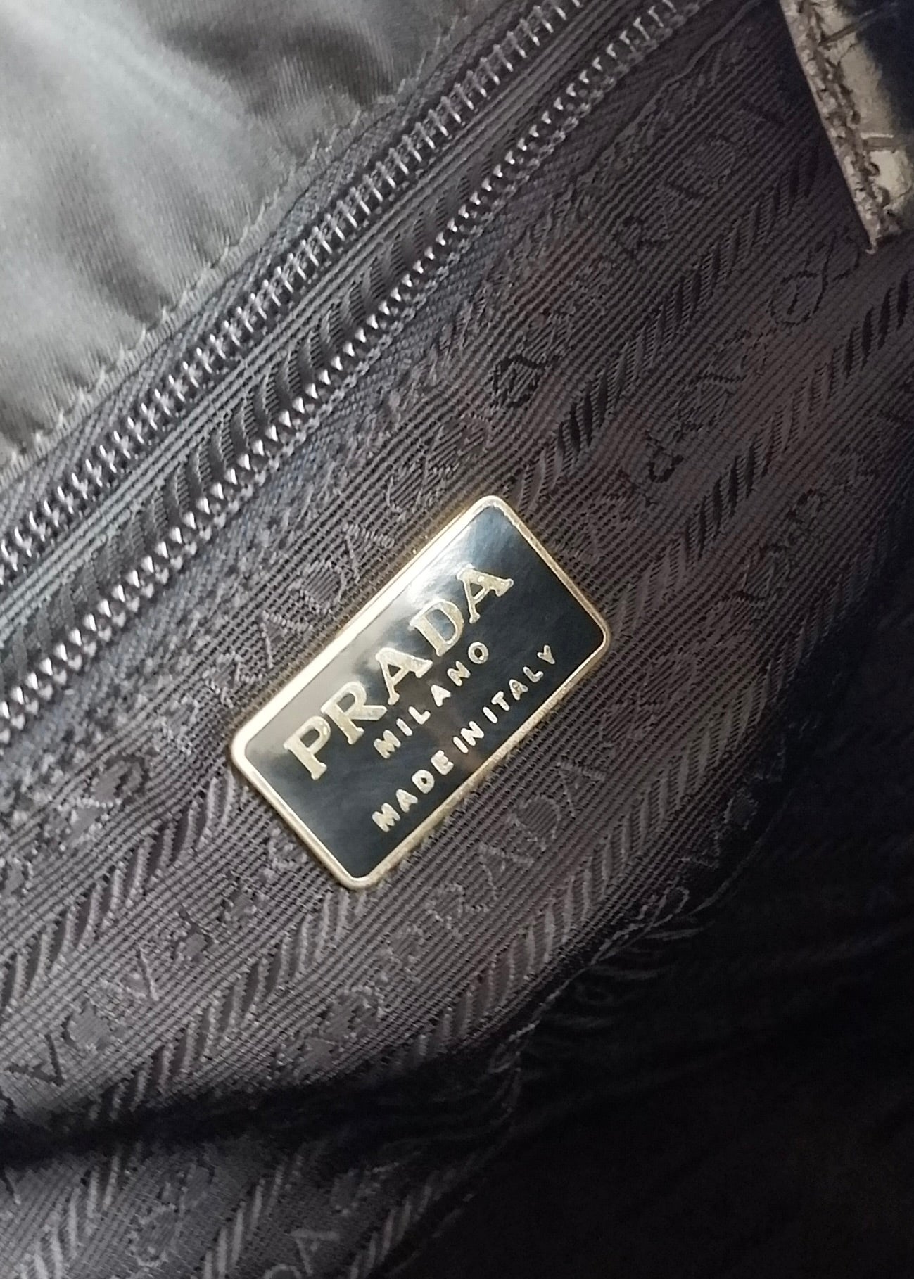 Sac à dos Prada authentique d'occasion en nylon et cuir noir