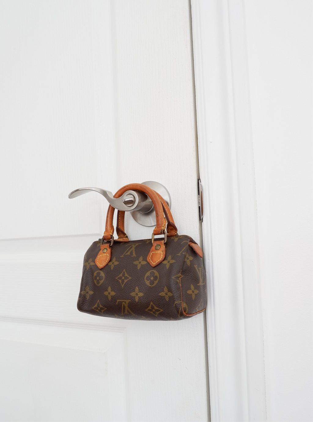 Sac Louis Vuitton Speedy Mini Monogram authentique d'occasion (bandoulière)