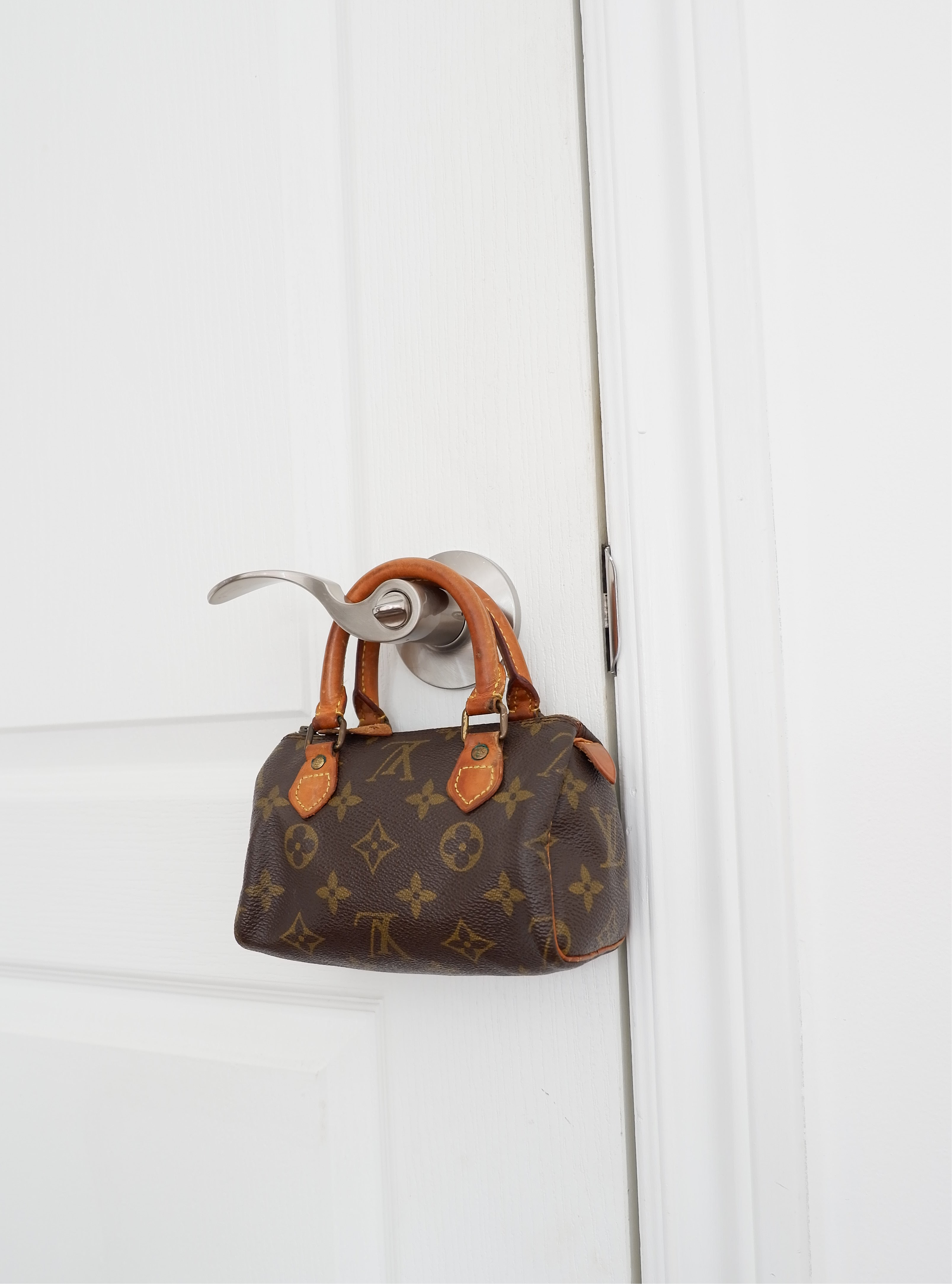 Sac Louis Vuitton Speedy Mini Monogram authentique d'occasion (bandoulière)