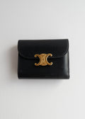 Portefeuille Celine Triomphe noir authentique d'occasion