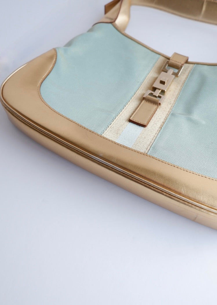 Authentique sac à bandoulière Gucci Jackie bleu/doré d'occasion