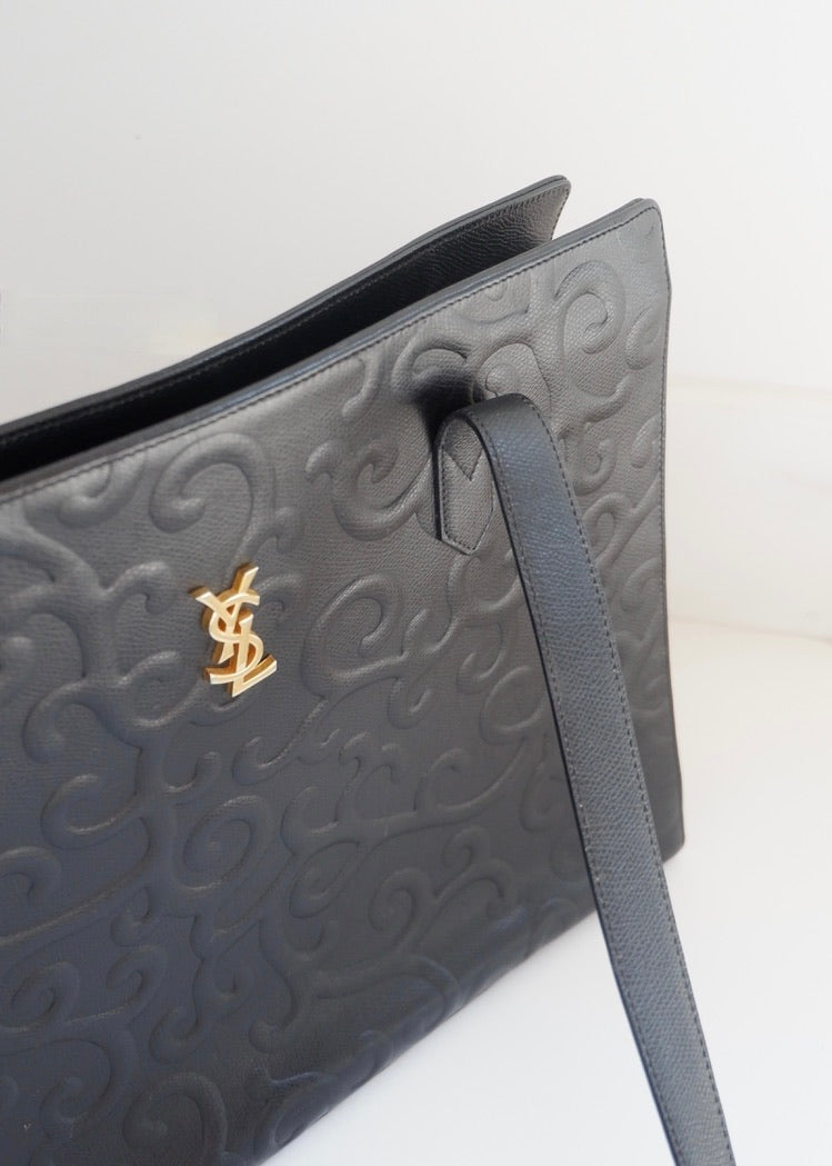 Preowned Vintage YSL Black Leather Embossed Printed Tote Bag