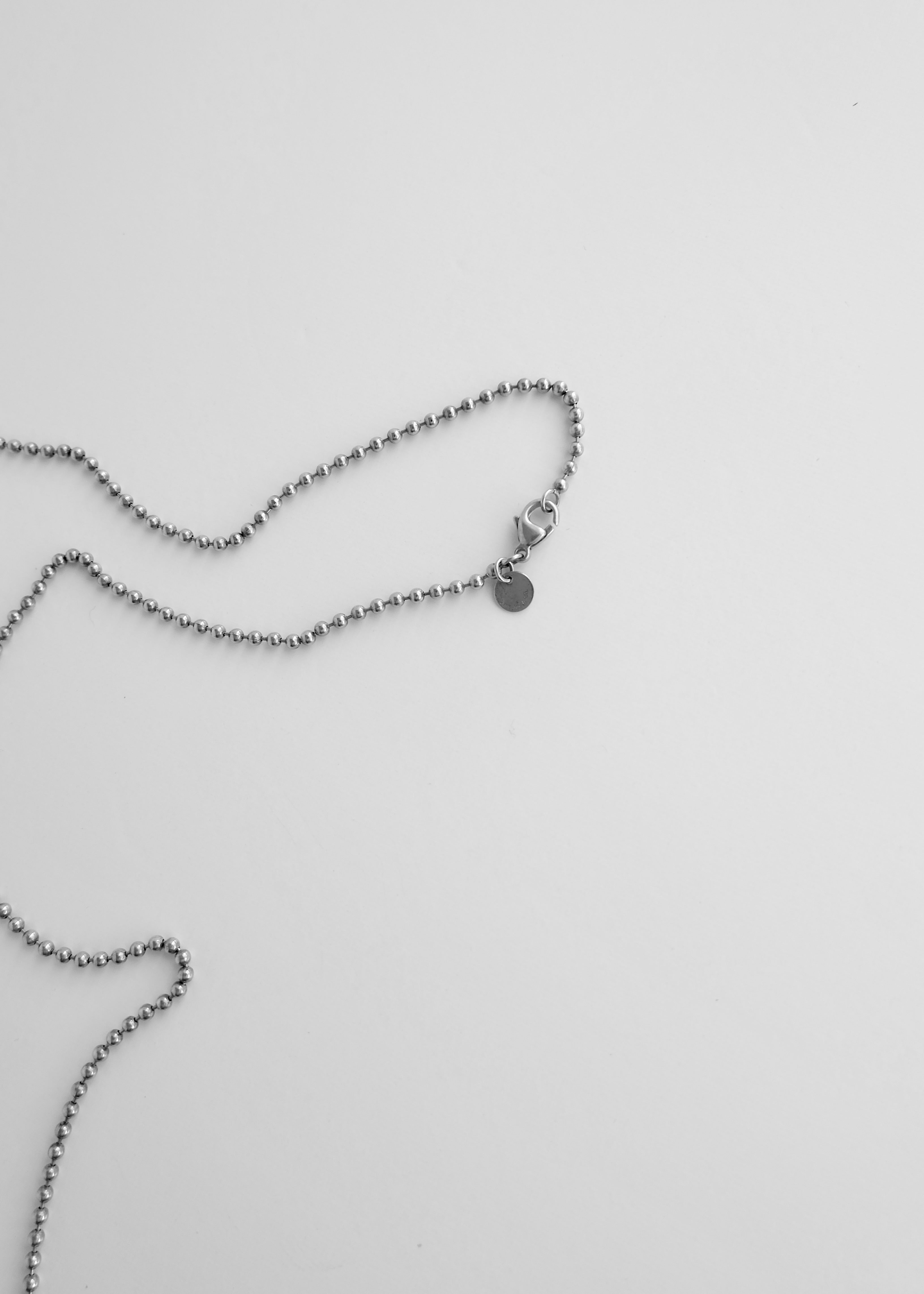 Authentique collier long chaîne avec pendentif plaque militaire Tiffany & Co. en argent d'occasion
