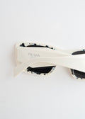 Authentiques lunettes de soleil œil-de-chat Prada blanches d'occasion
