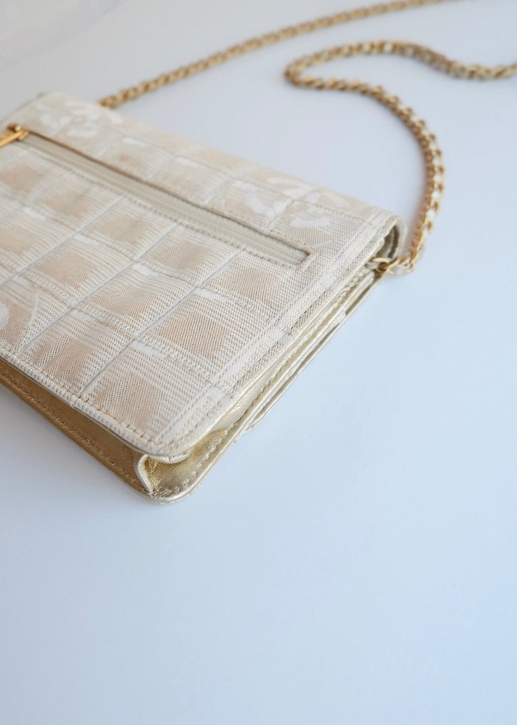 Authentic Preowned Chanel Gold Canvas New Travel Line WOC Bag