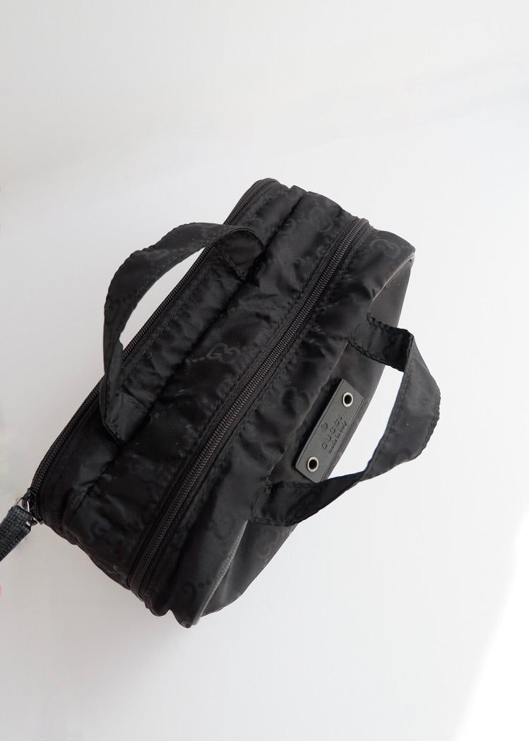 Pochette vanity Gucci en nylon GG noir d'occasion authentique