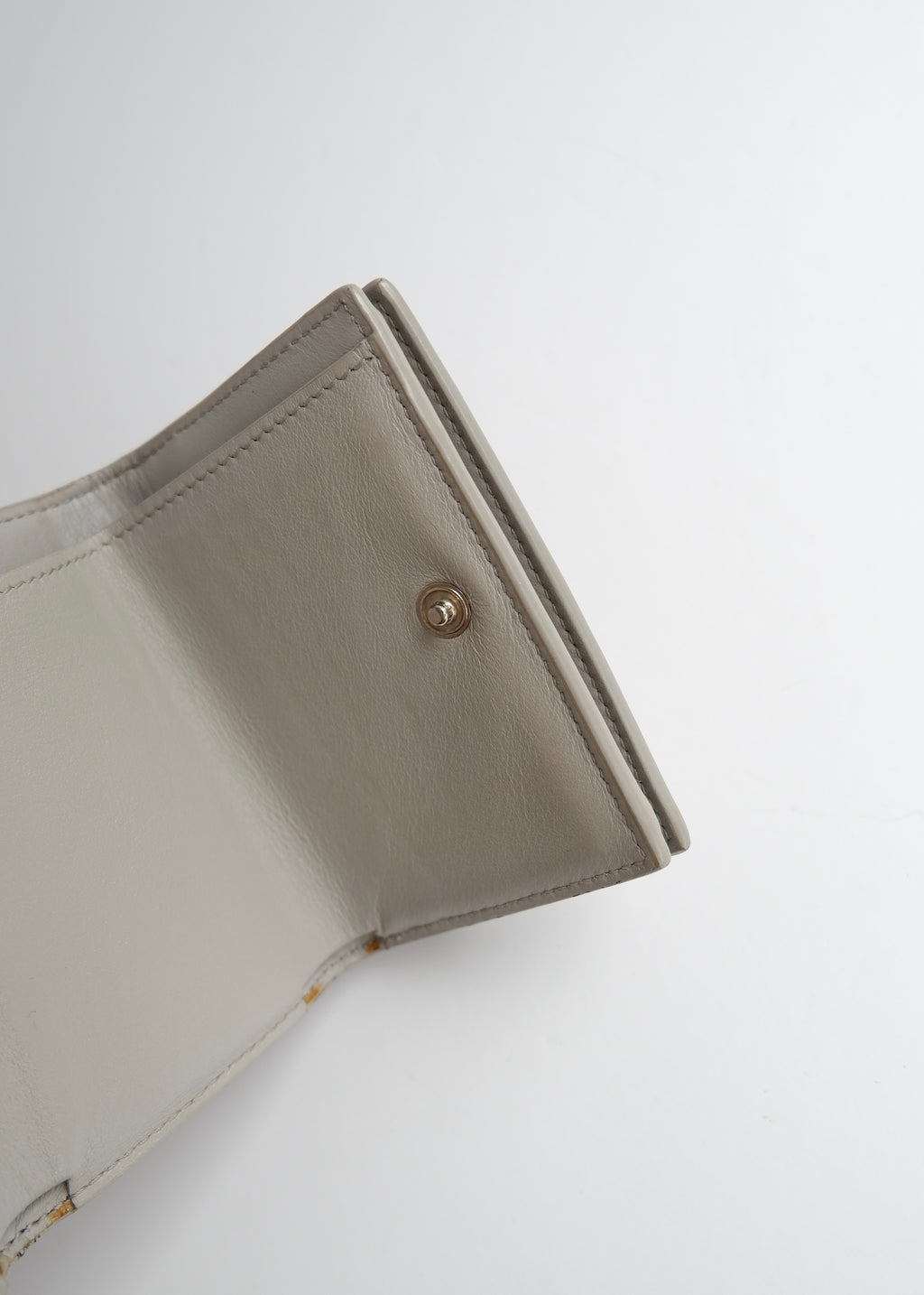 Preowned Saint Laurent Grey Leather Embossed Compact Wallet