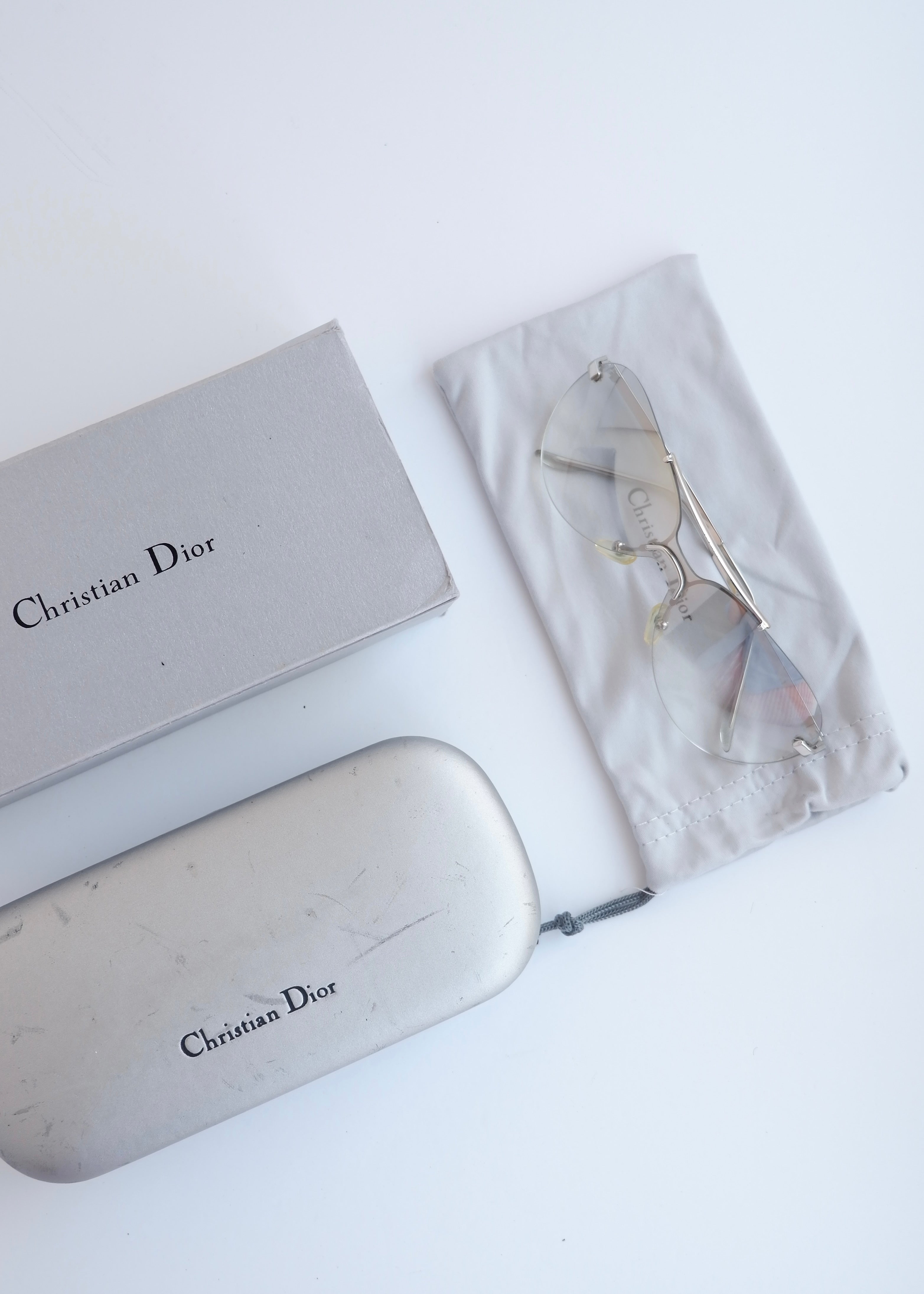 Authentiques lunettes de soleil Dior d'occasion à monture bouclier argent/transparent
