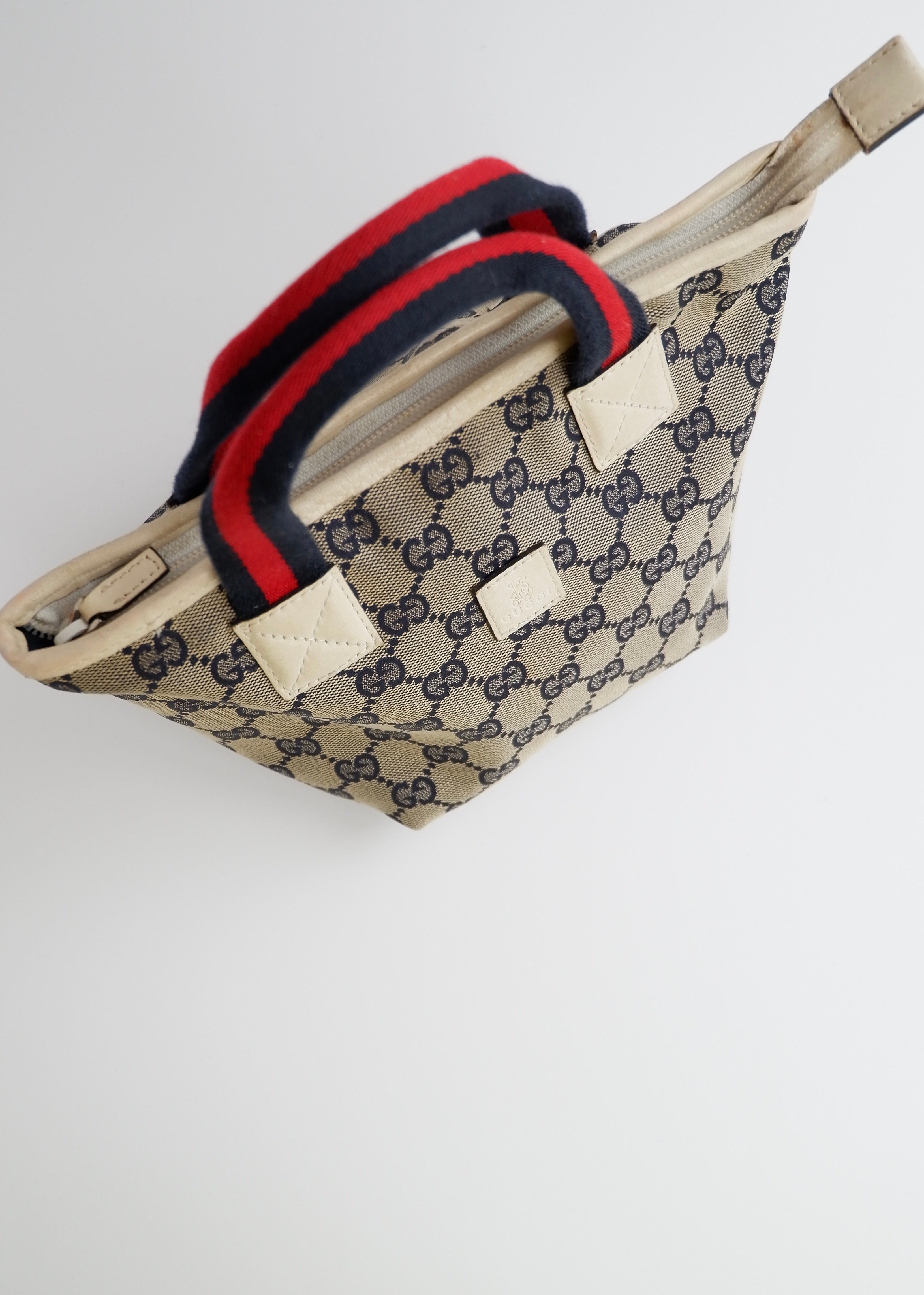 Authentic Preowned Gucci Navy GG Canvas Micro Handbag