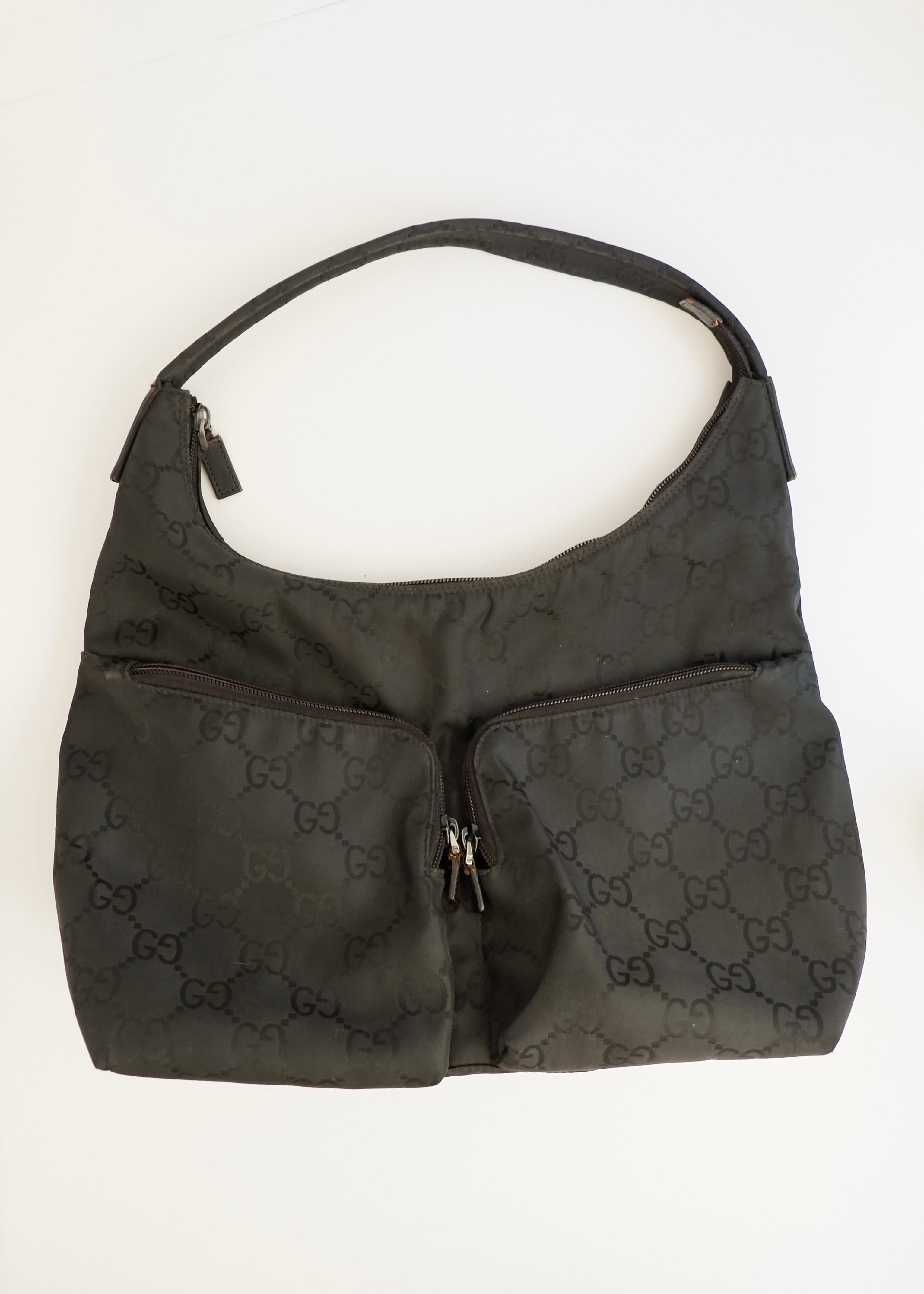Authentique Sac à bandoulière Gucci en toile GG noire d'occasion