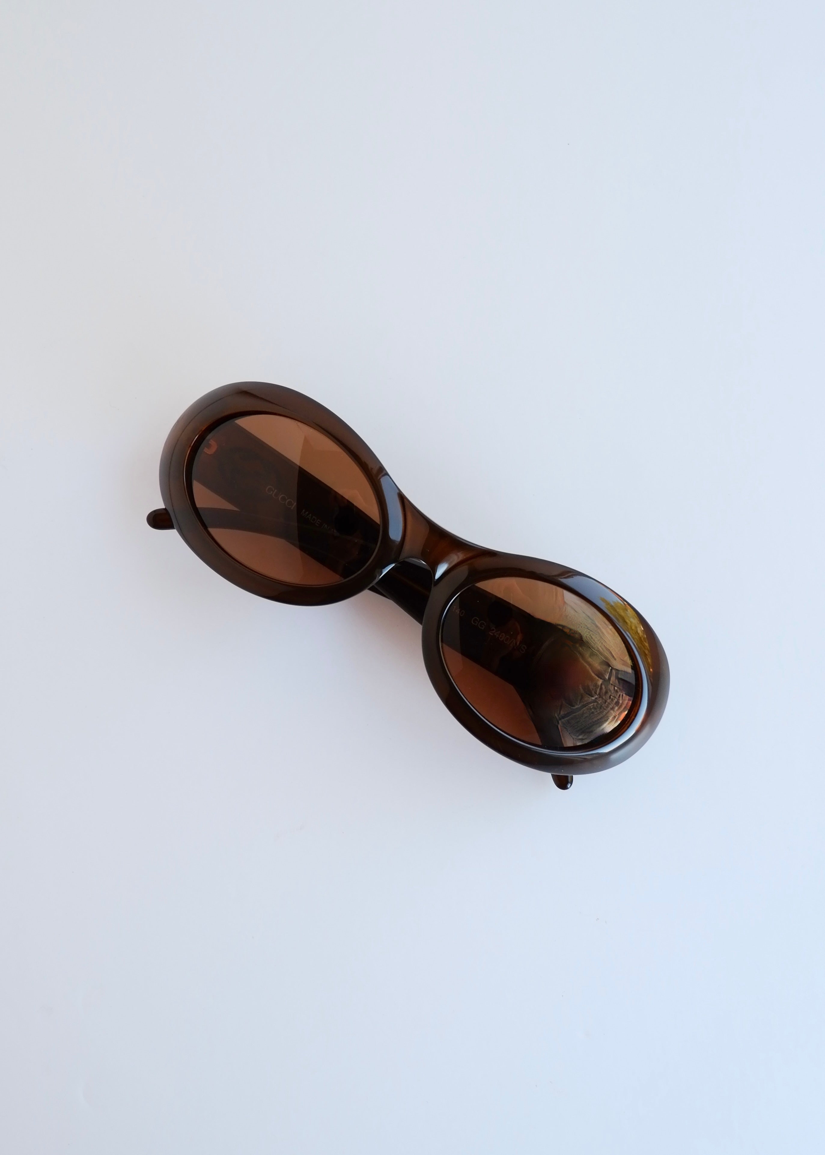Authentiques lunettes de soleil vintage d'occasion Gucci à monture ronde en acétate marron