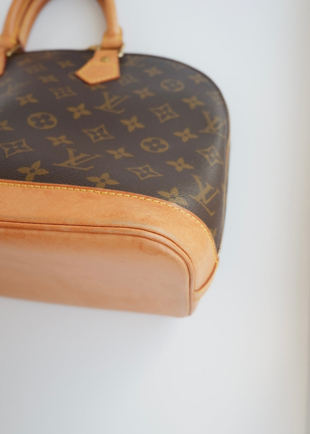 Sac à main Louis Vuitton Alma Monogram d'occasion authentique