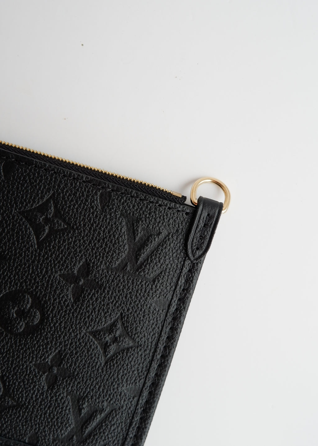 Pochette de poignet Louis Vuitton Neverfull monogramme Empreinte noir authentique d'occasion