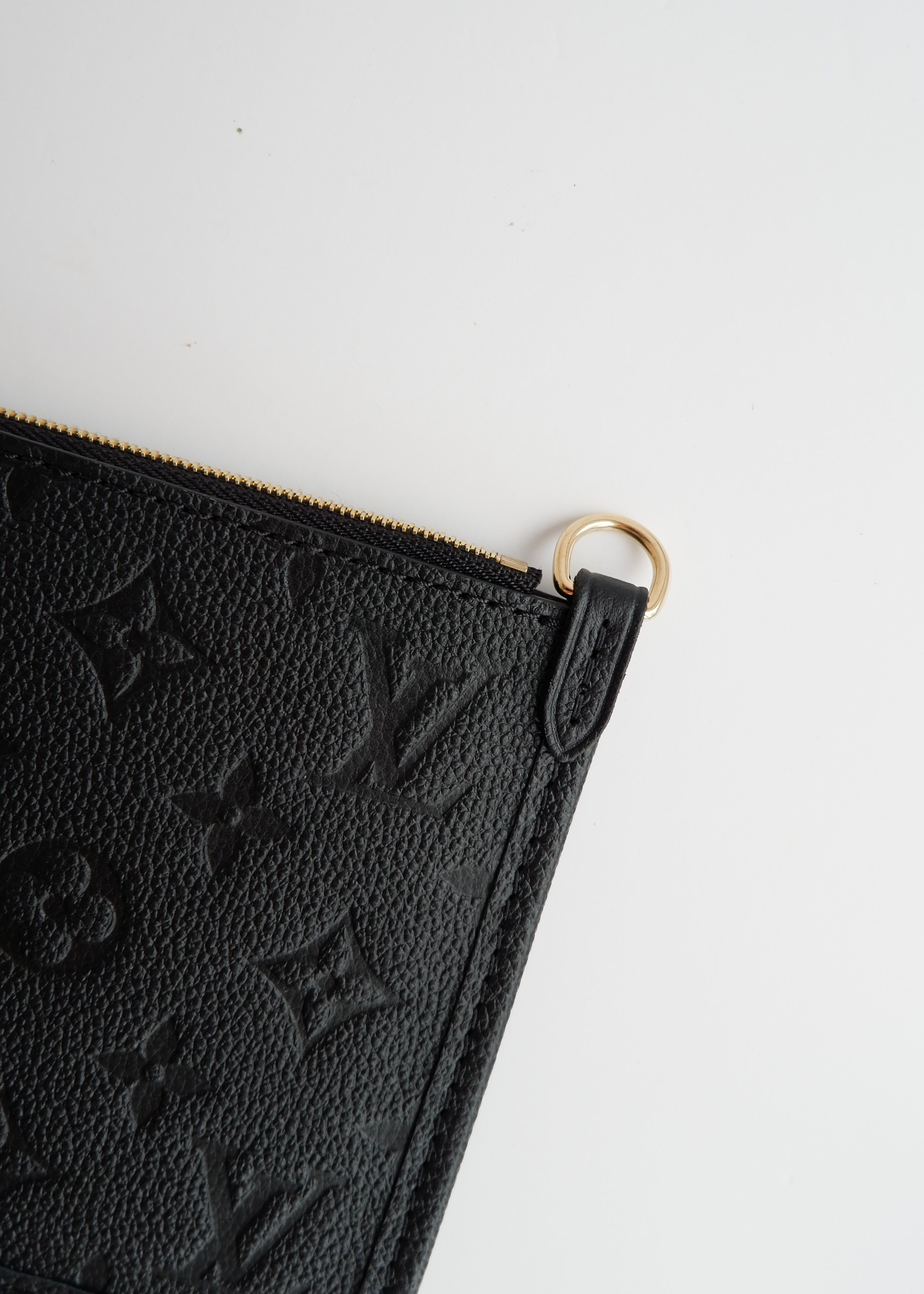 Authentic Preowned Louis Vuitton Black Empreinte Monogram Wrislet Pouch (For Neverfull)