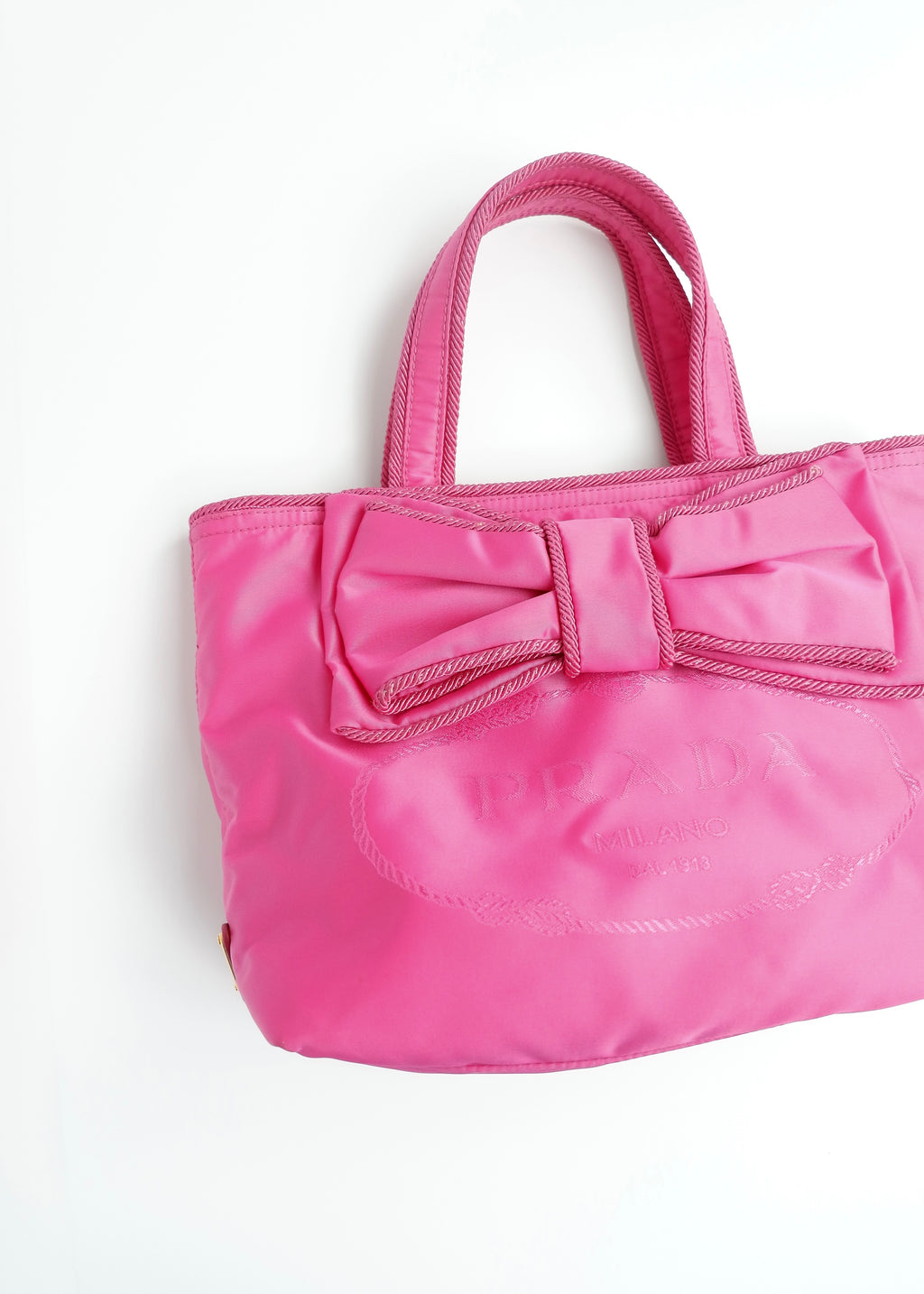 Authentique sac Prada deux façons en nylon rose vif d'occasion