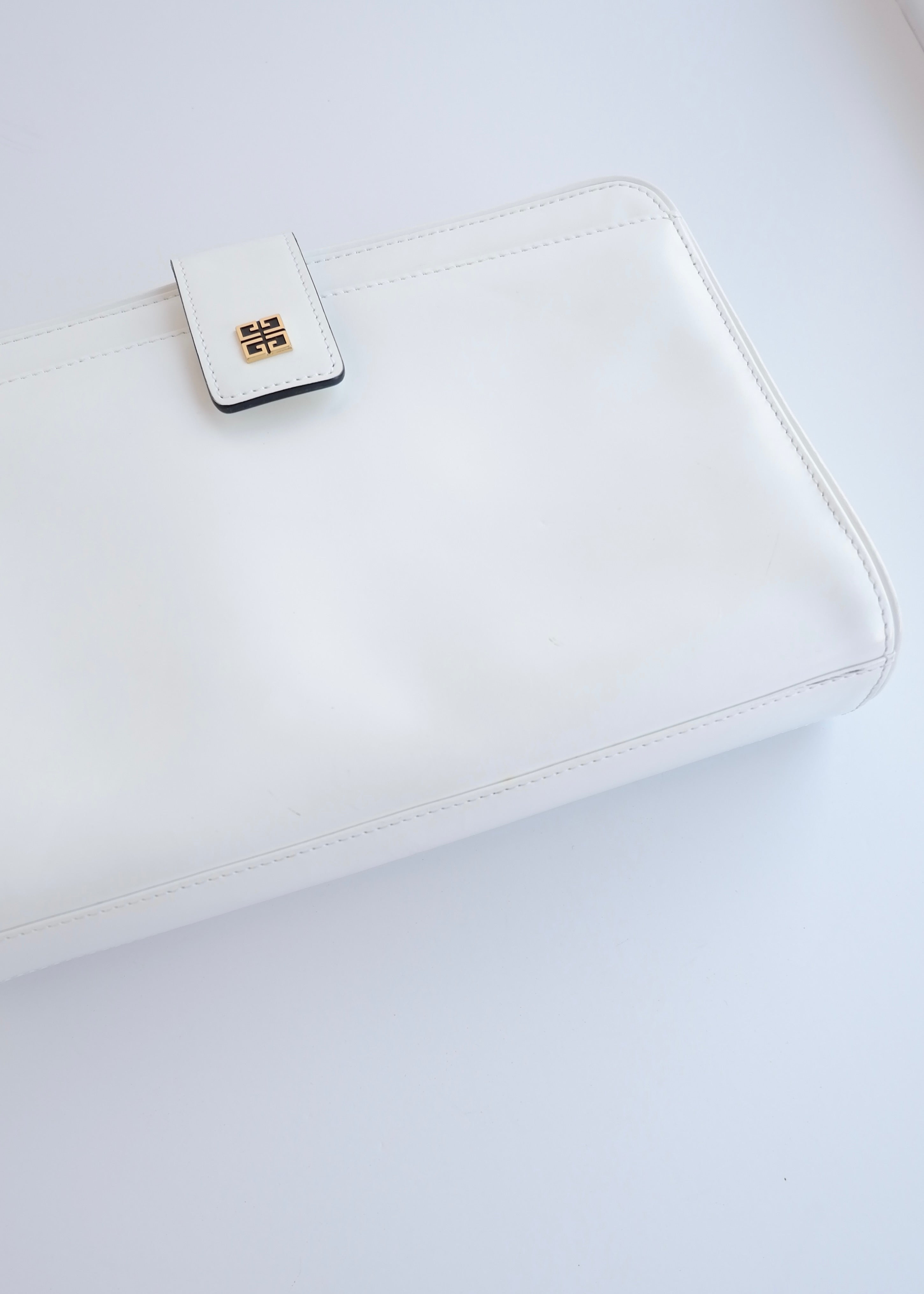Pochette en cuir blanc Givenchy vintage authentique d'occasion