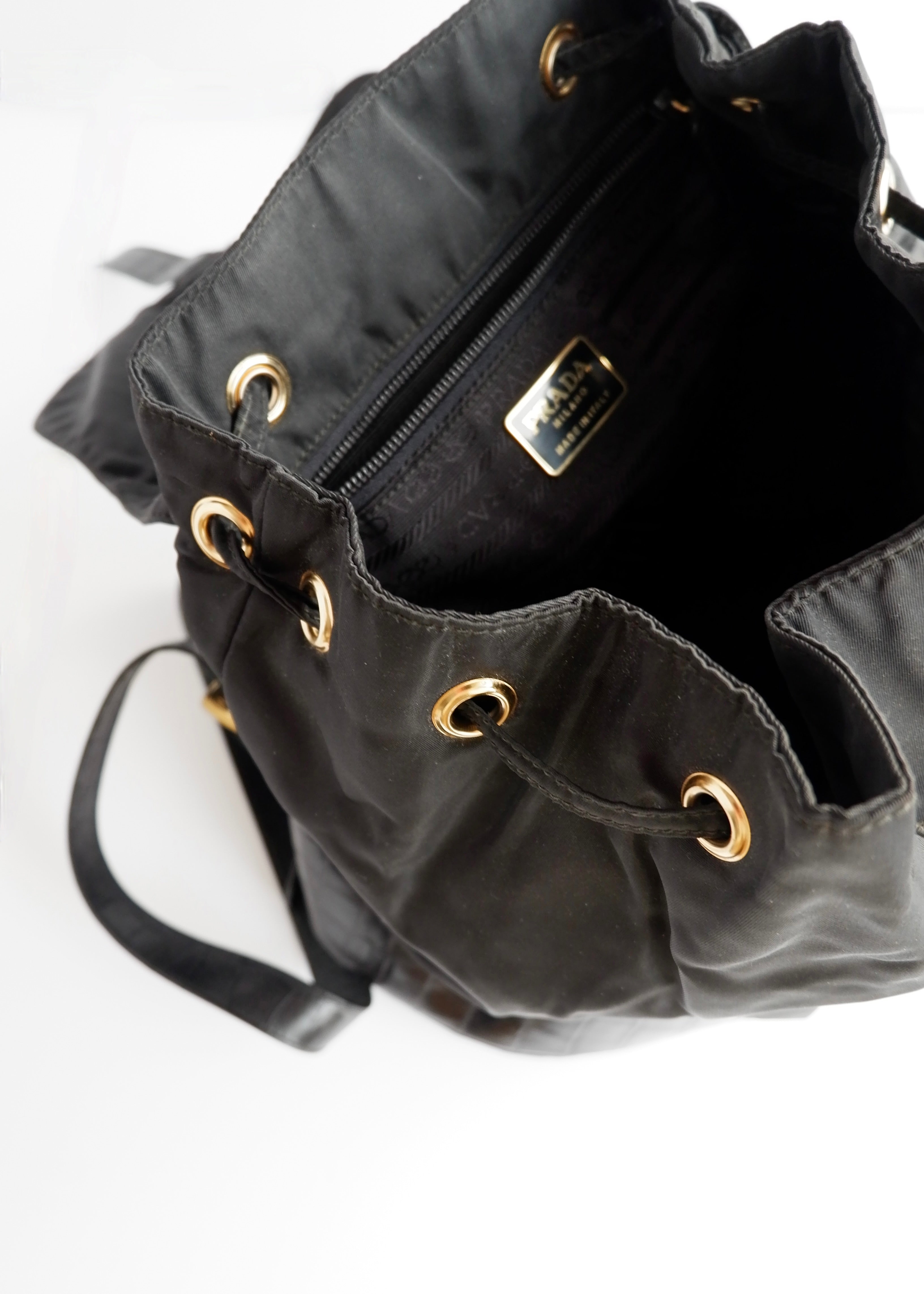 Sac à dos Prada authentique d'occasion en nylon et cuir noir