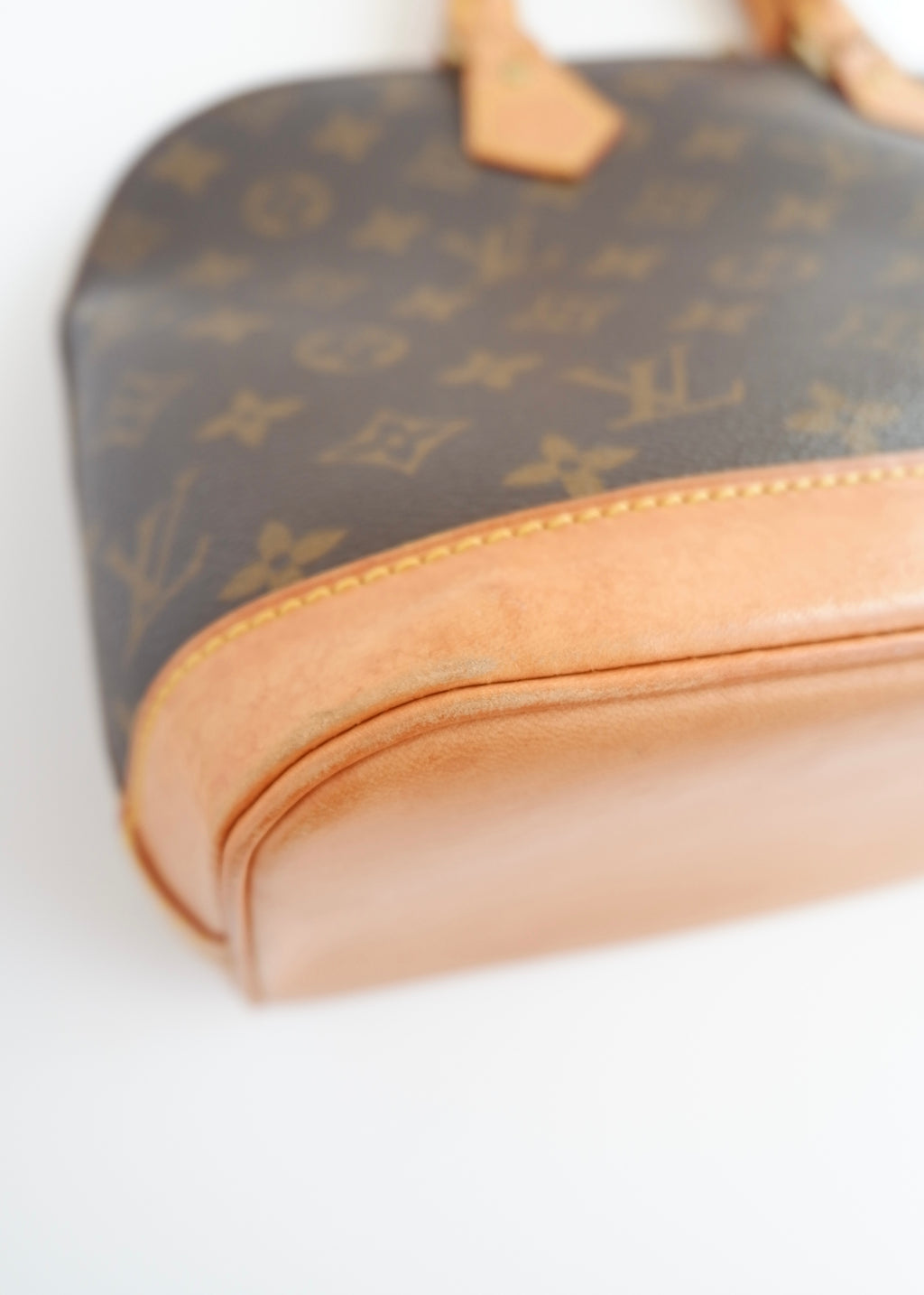 Sac à main Louis Vuitton Alma Monogram d'occasion authentique