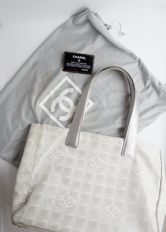 Authentic Preowned Chanel Silver Canvas New Travel Line Tote Bag