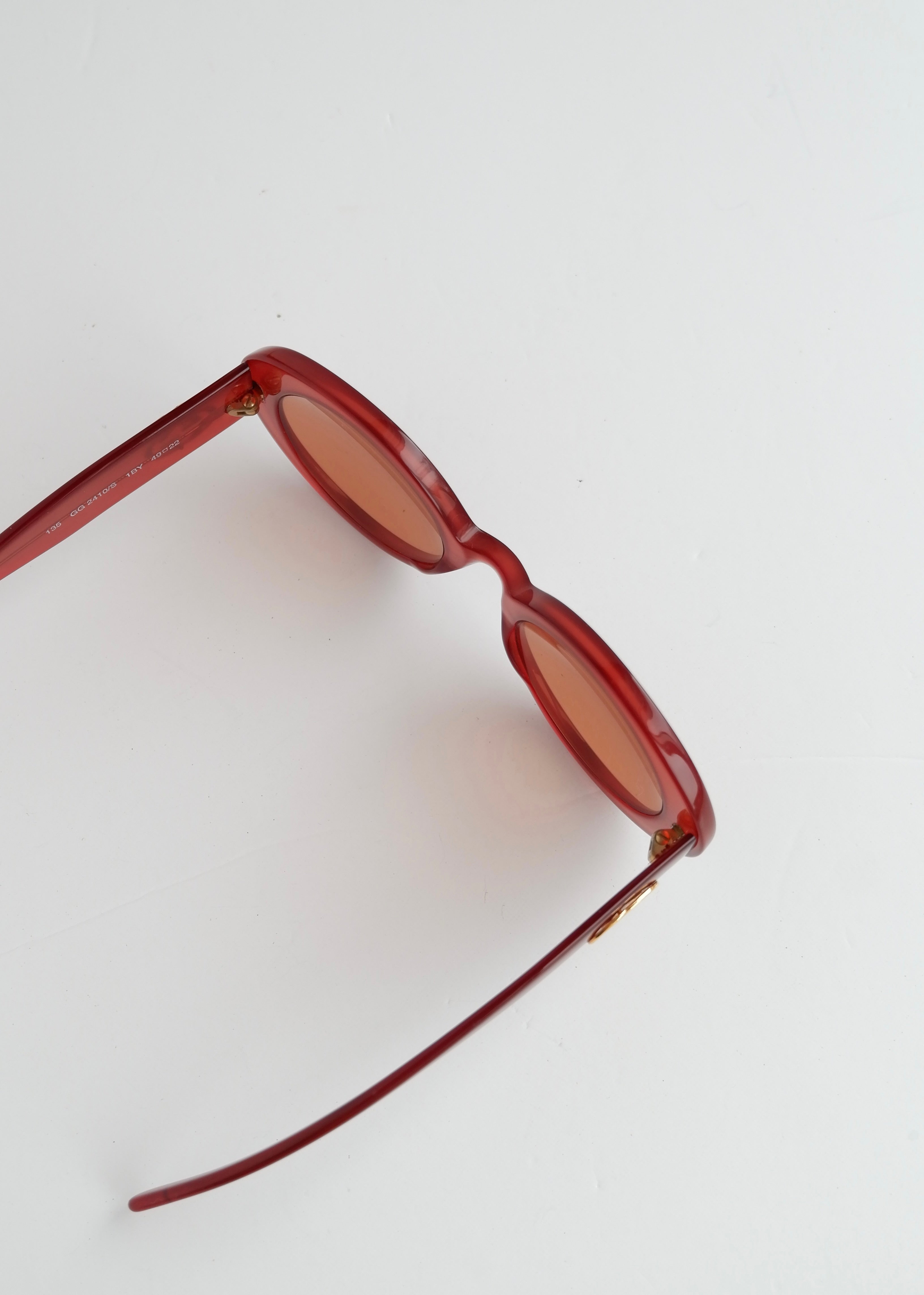 Authentiques lunettes de soleil Gucci rouges à monture ronde d'occasion