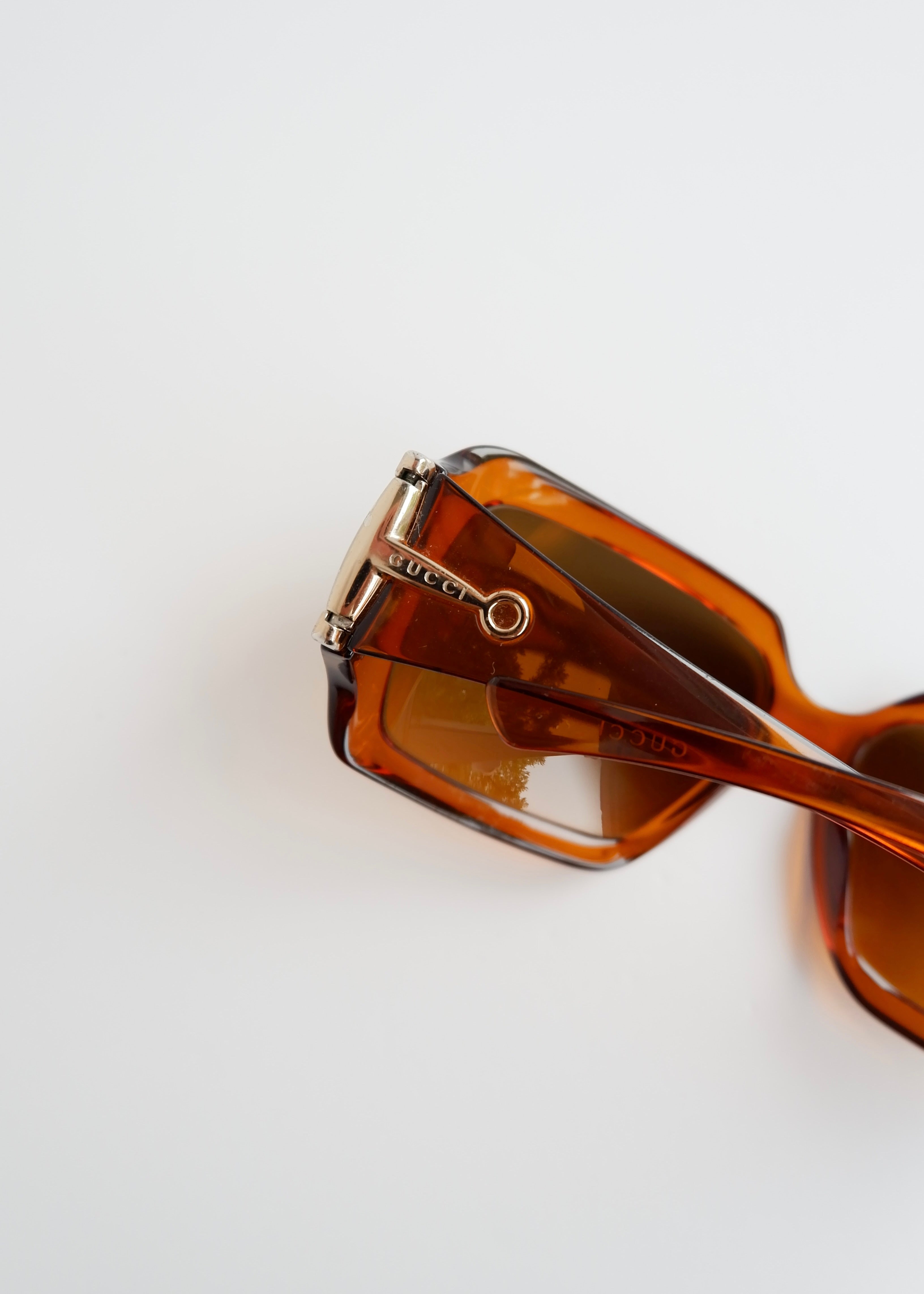 Authentiques Lunettes de Soleil Carrées Gucci Marron avec Mors de Cheval d'Occasion