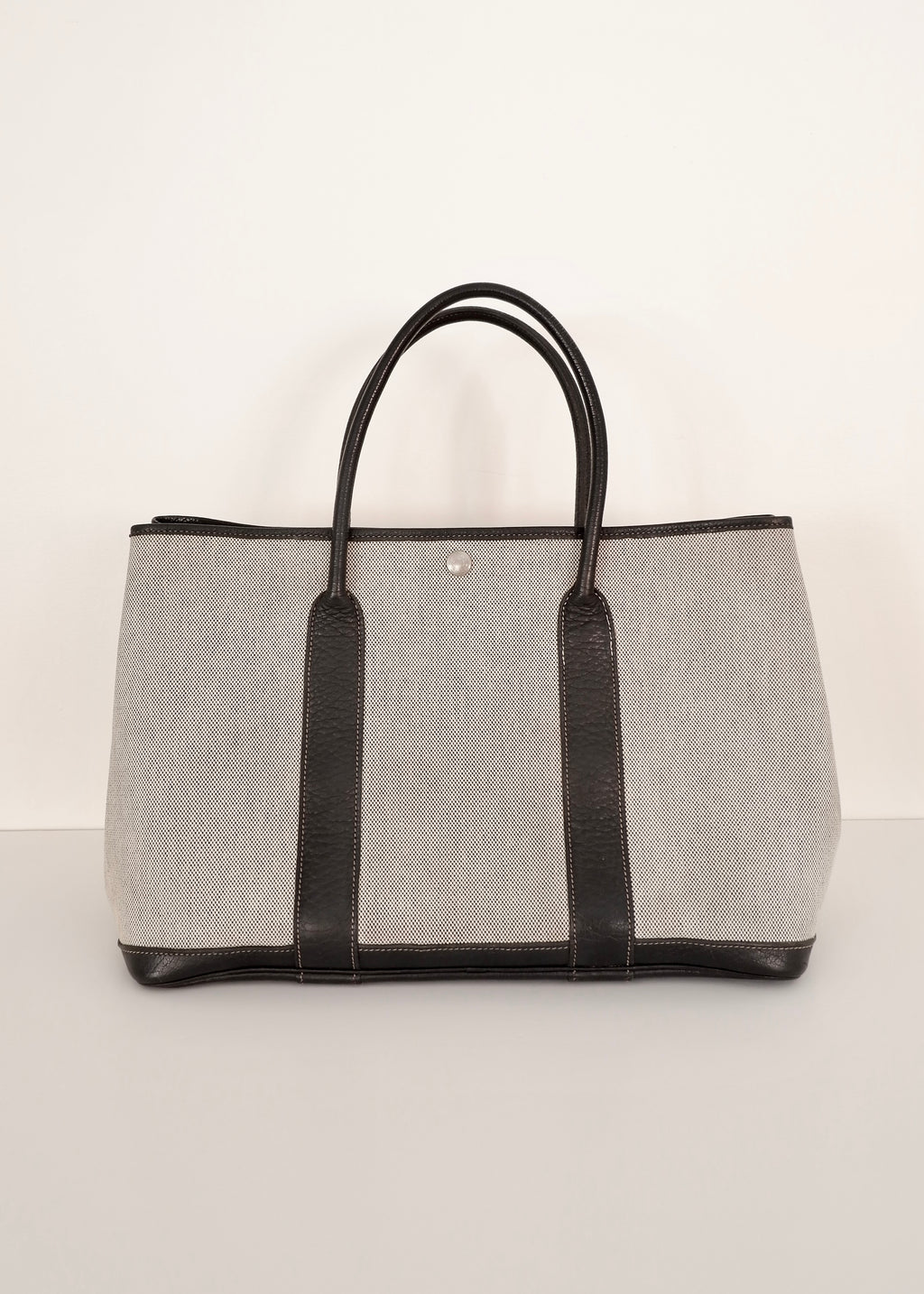 Sac cabas Hermès Garden Party authentique d'occasion en cuir et toile noirs/gris