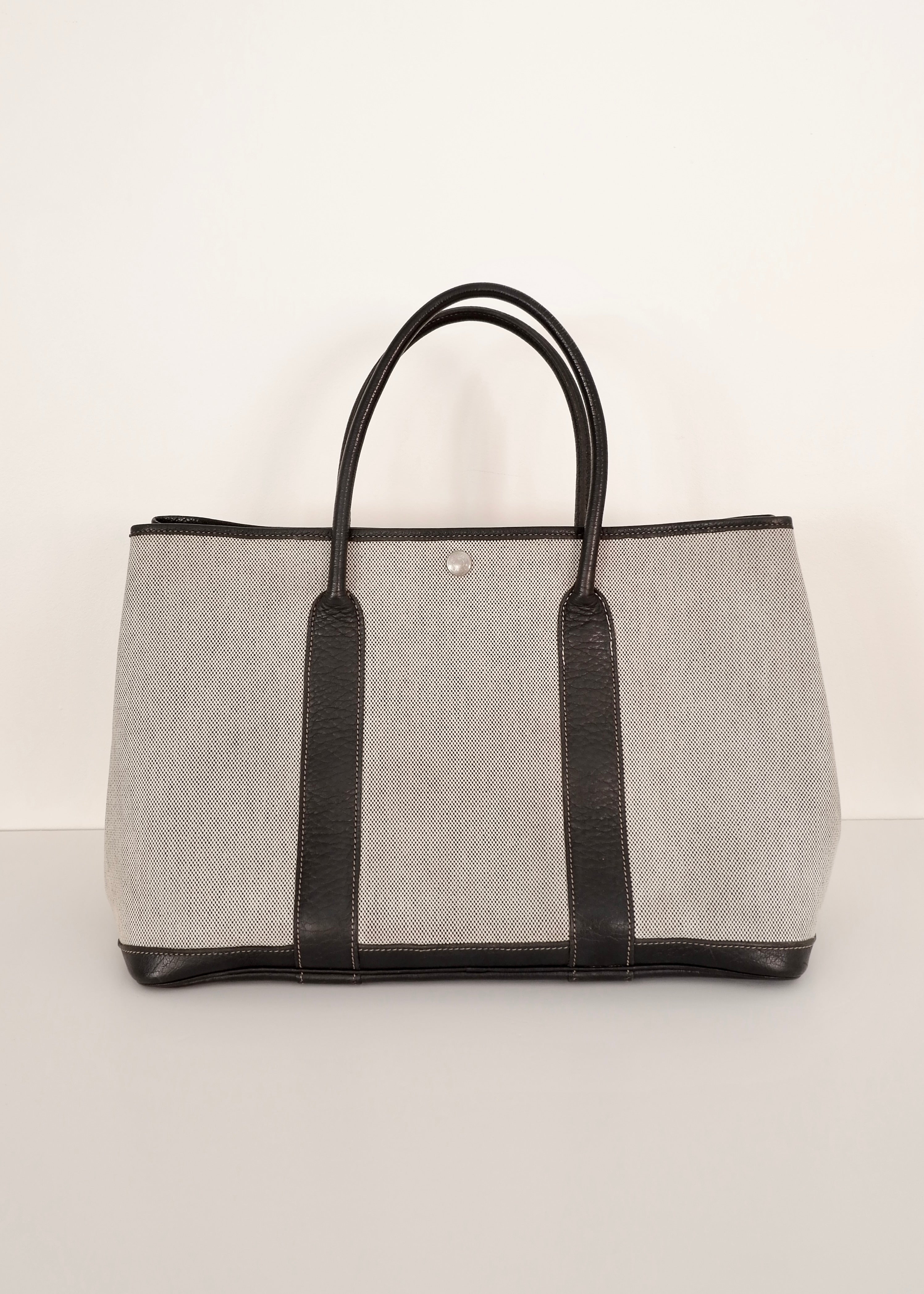 Sac cabas Hermès Garden Party authentique d'occasion en cuir et toile noirs/gris