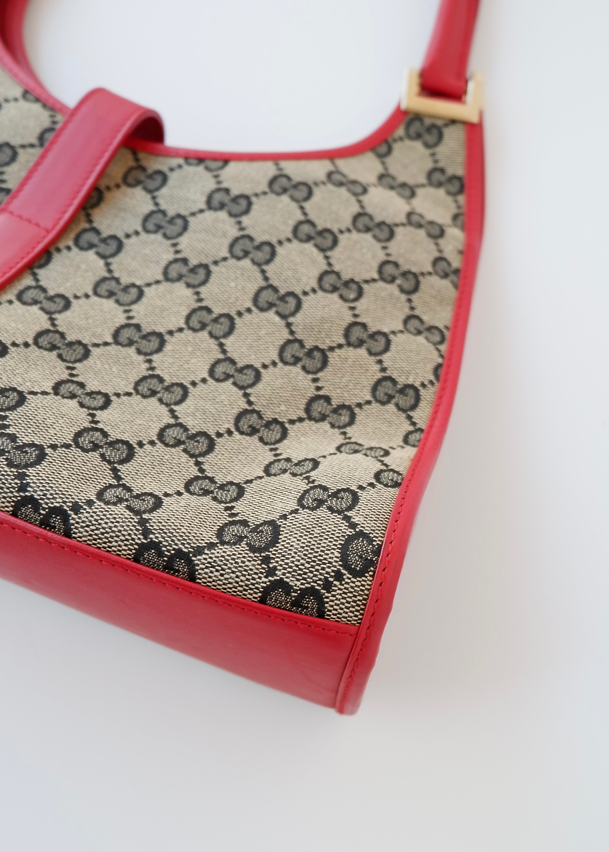Preowned Gucci Red GG Canvas Jackie Piston Closure Shoulder Bag