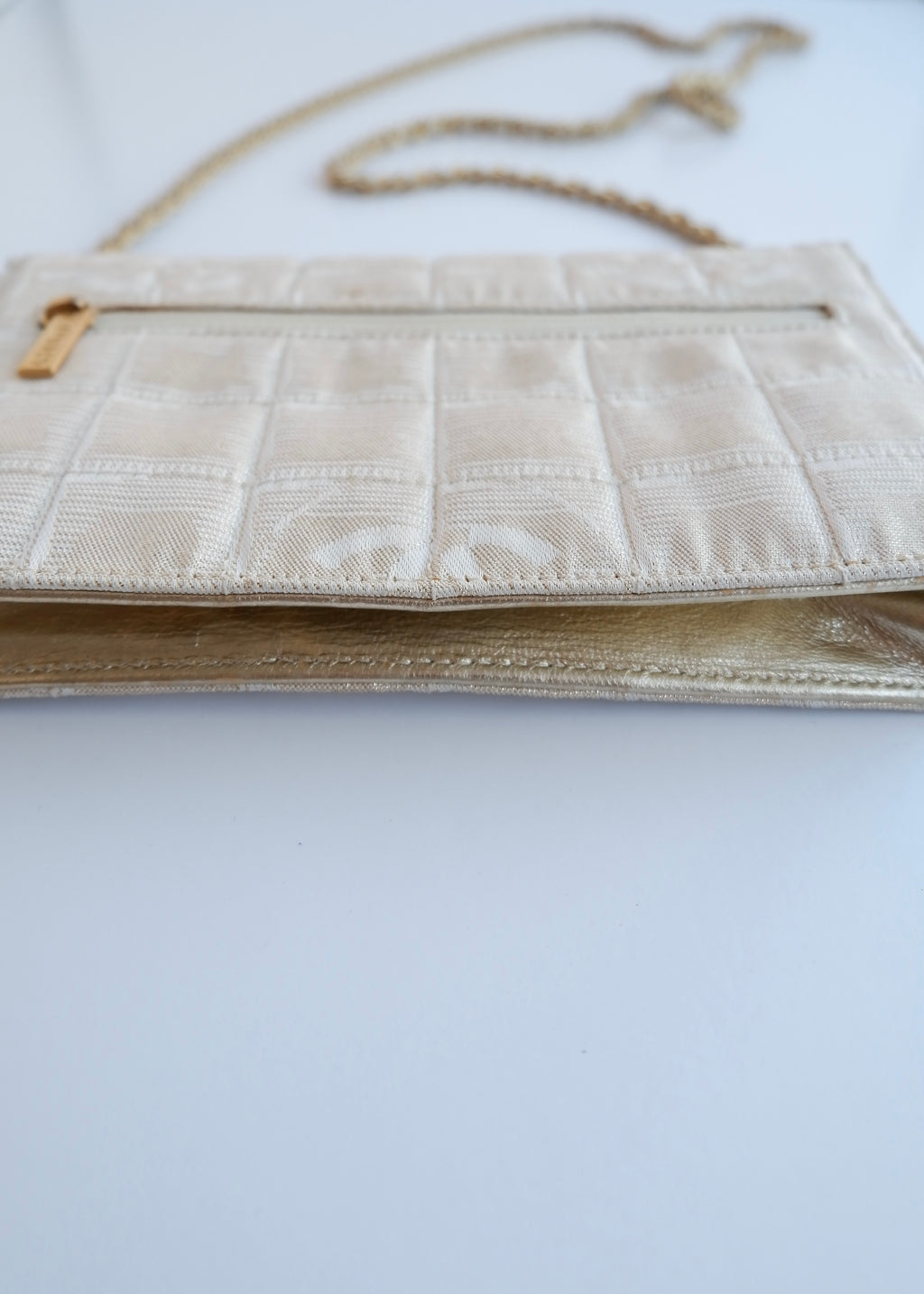 Authentic Preowned Chanel Gold Canvas New Travel Line WOC Bag