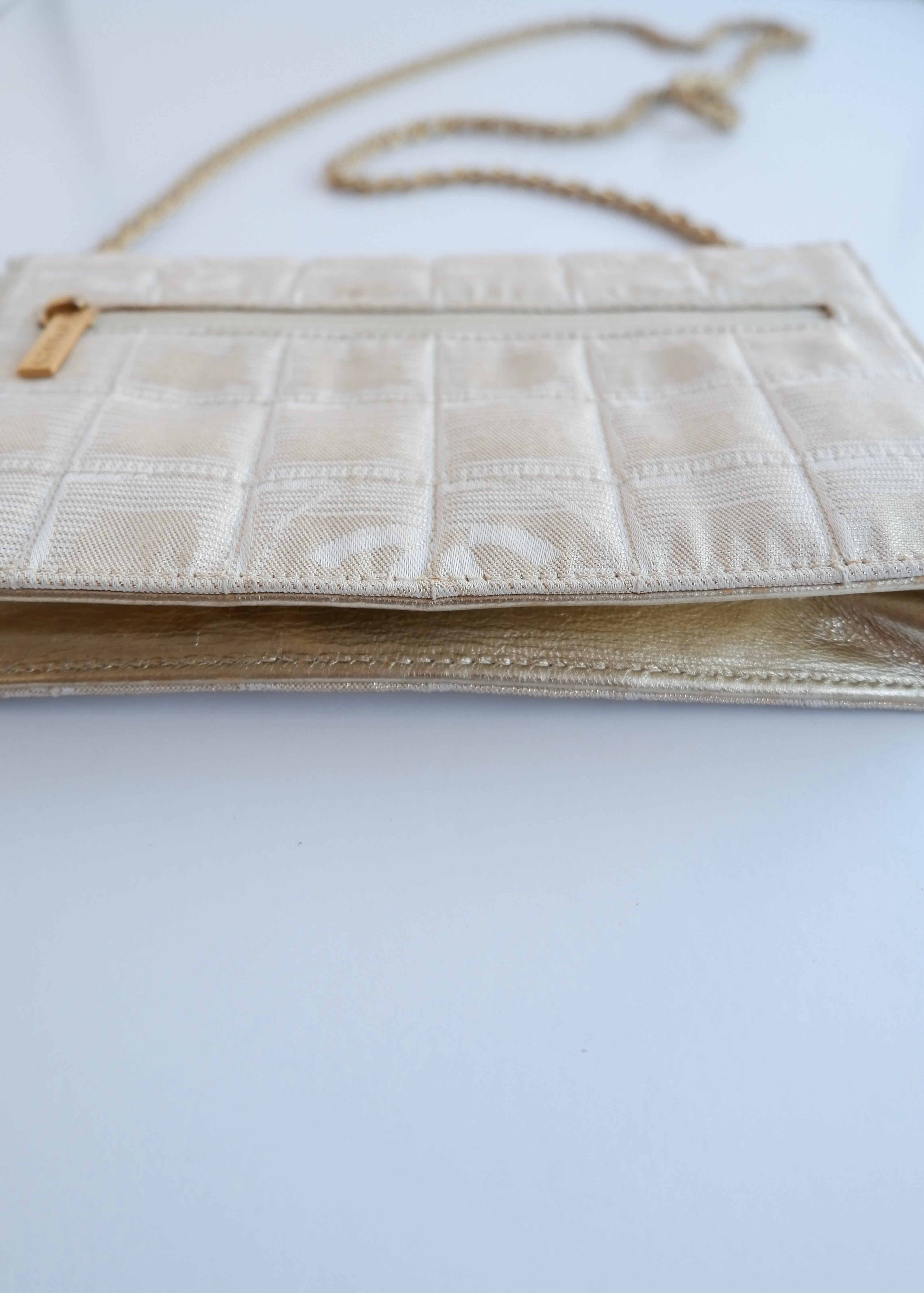 Authentic Preowned Chanel Gold Canvas New Travel Line WOC Bag