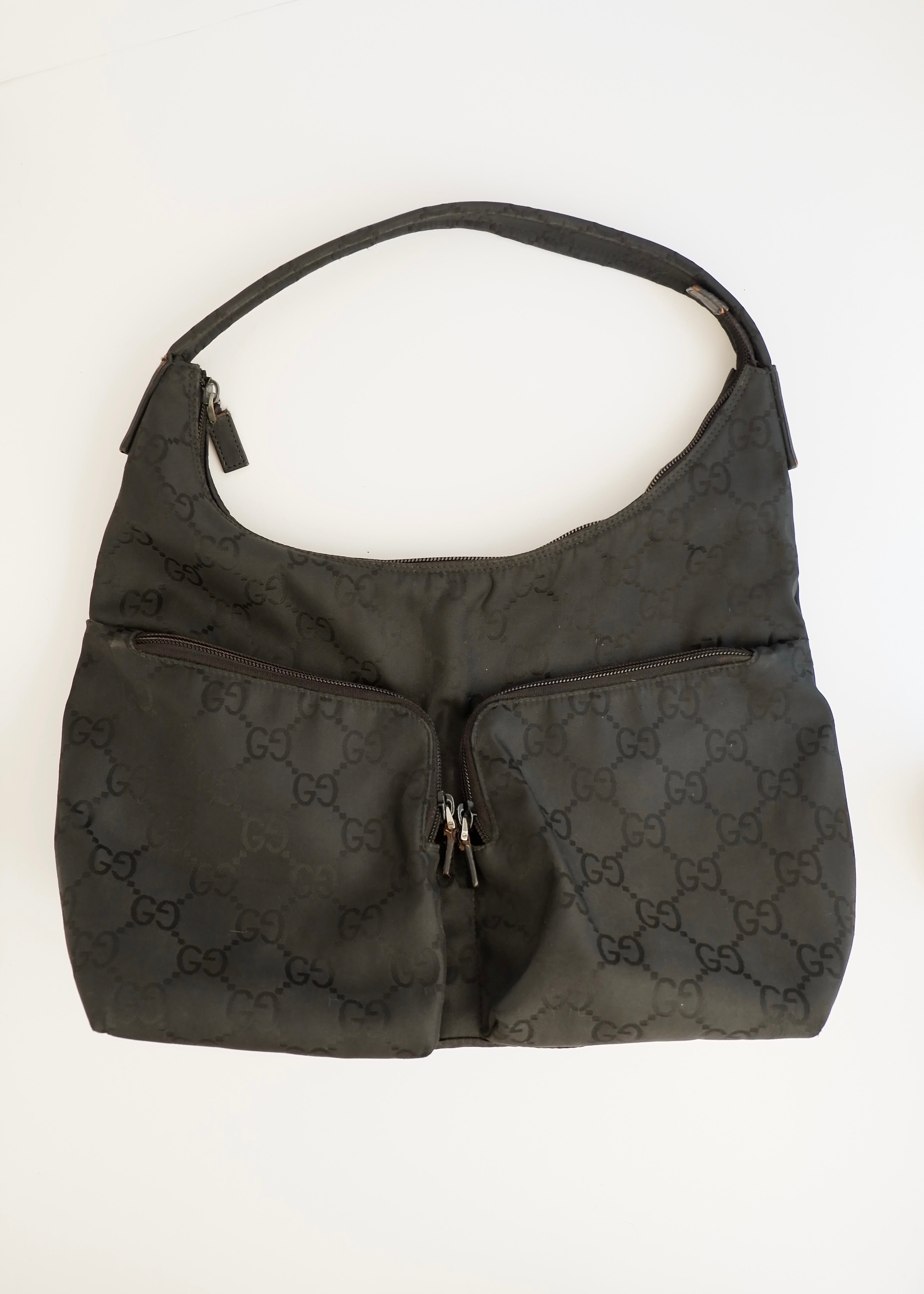 Authentique Sac à bandoulière Gucci en toile GG noire d'occasion