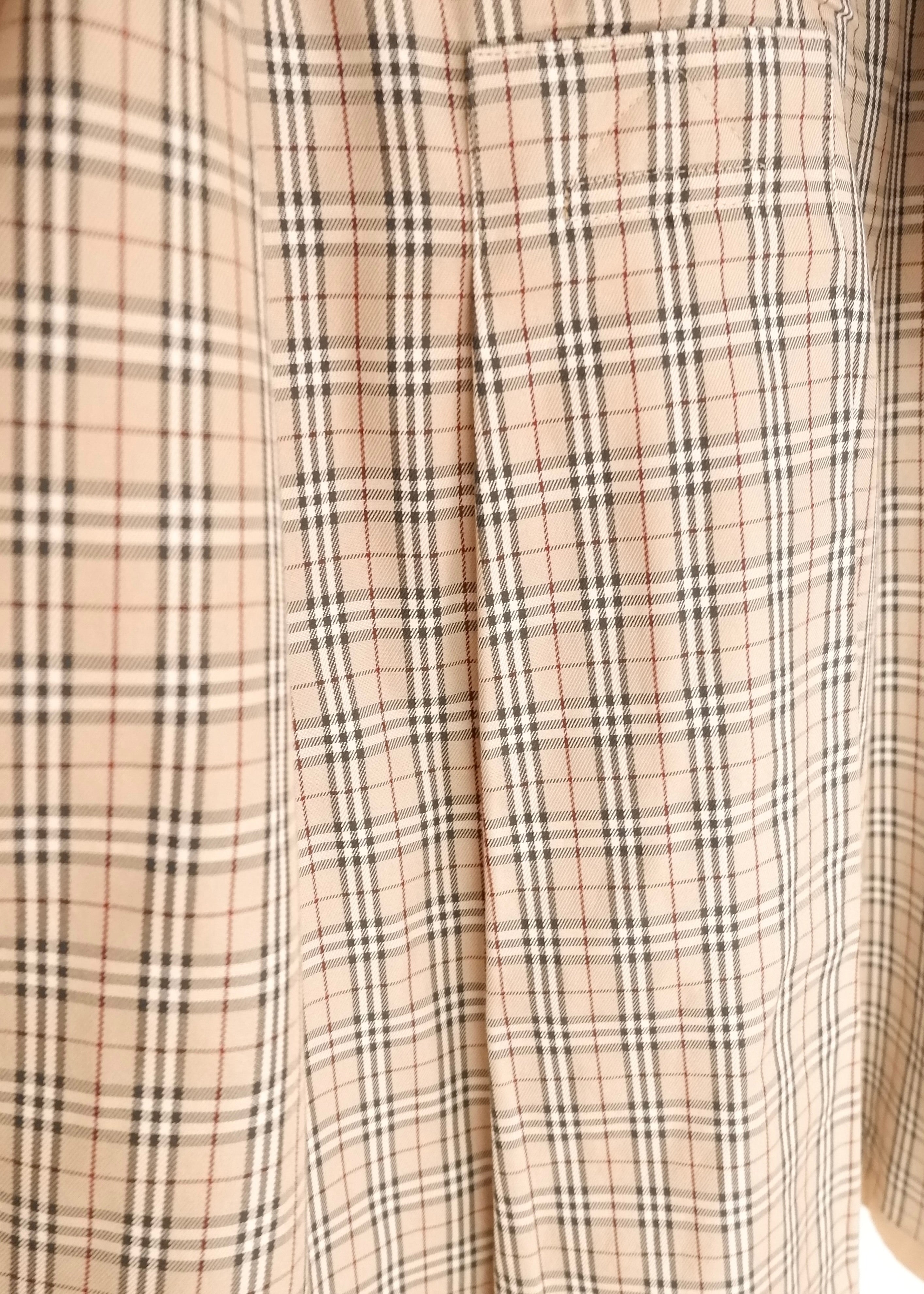 Trench-coat mi-long beige Burberry d'occasion authentique - T.S